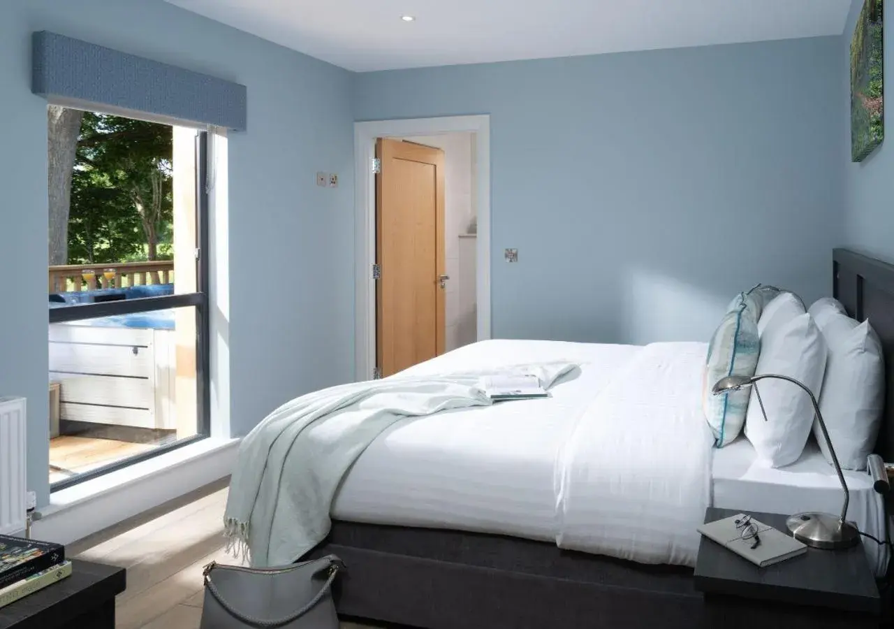 Bedroom, Bed in Killyhevlin Lakeside Hotel & Lodges Bedroom, Bed in Killyhevlin Lakeside Hotel & Lodges