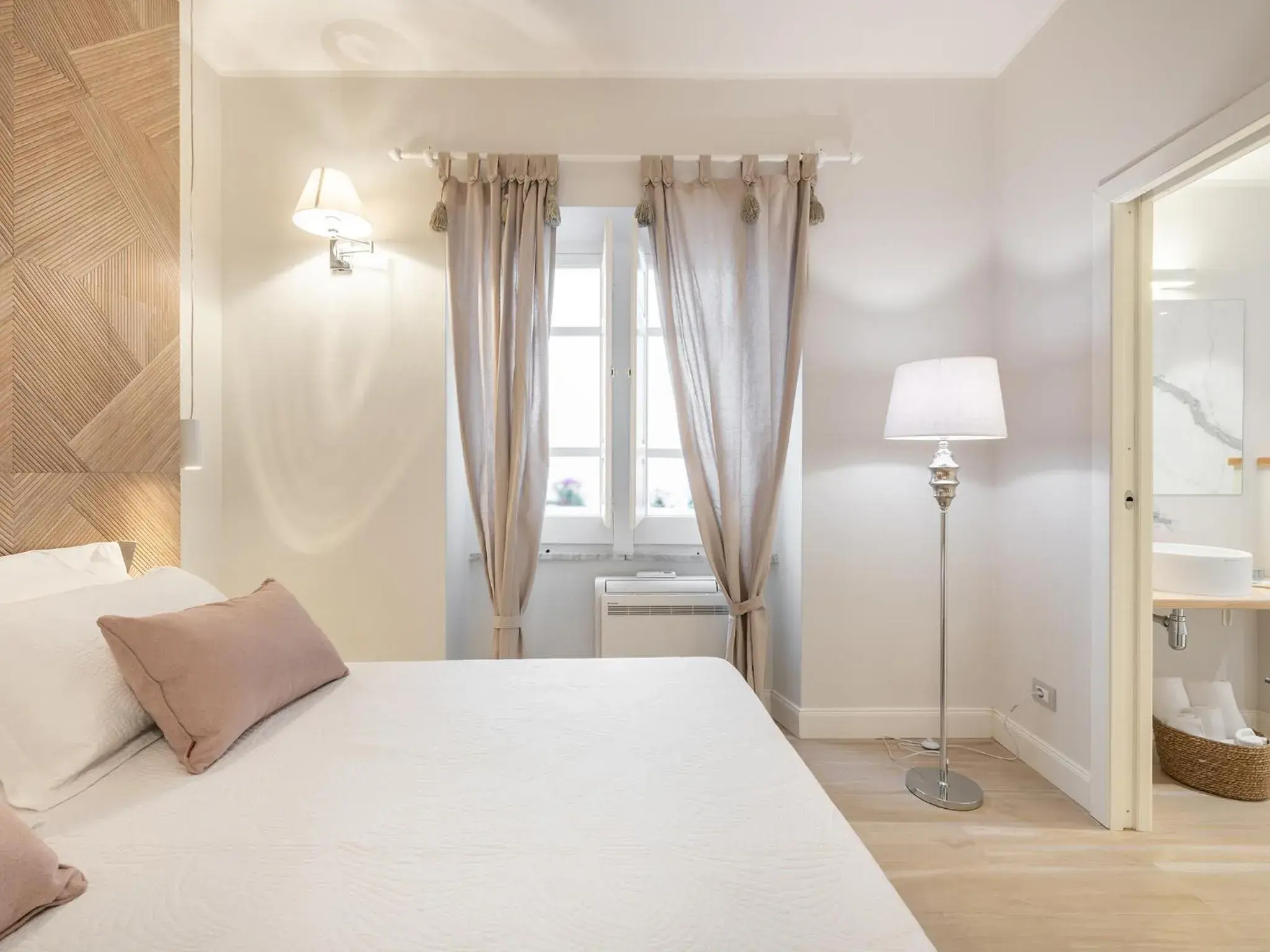 Bed in AQUAMADRE Suites Bed in AQUAMADRE Suites