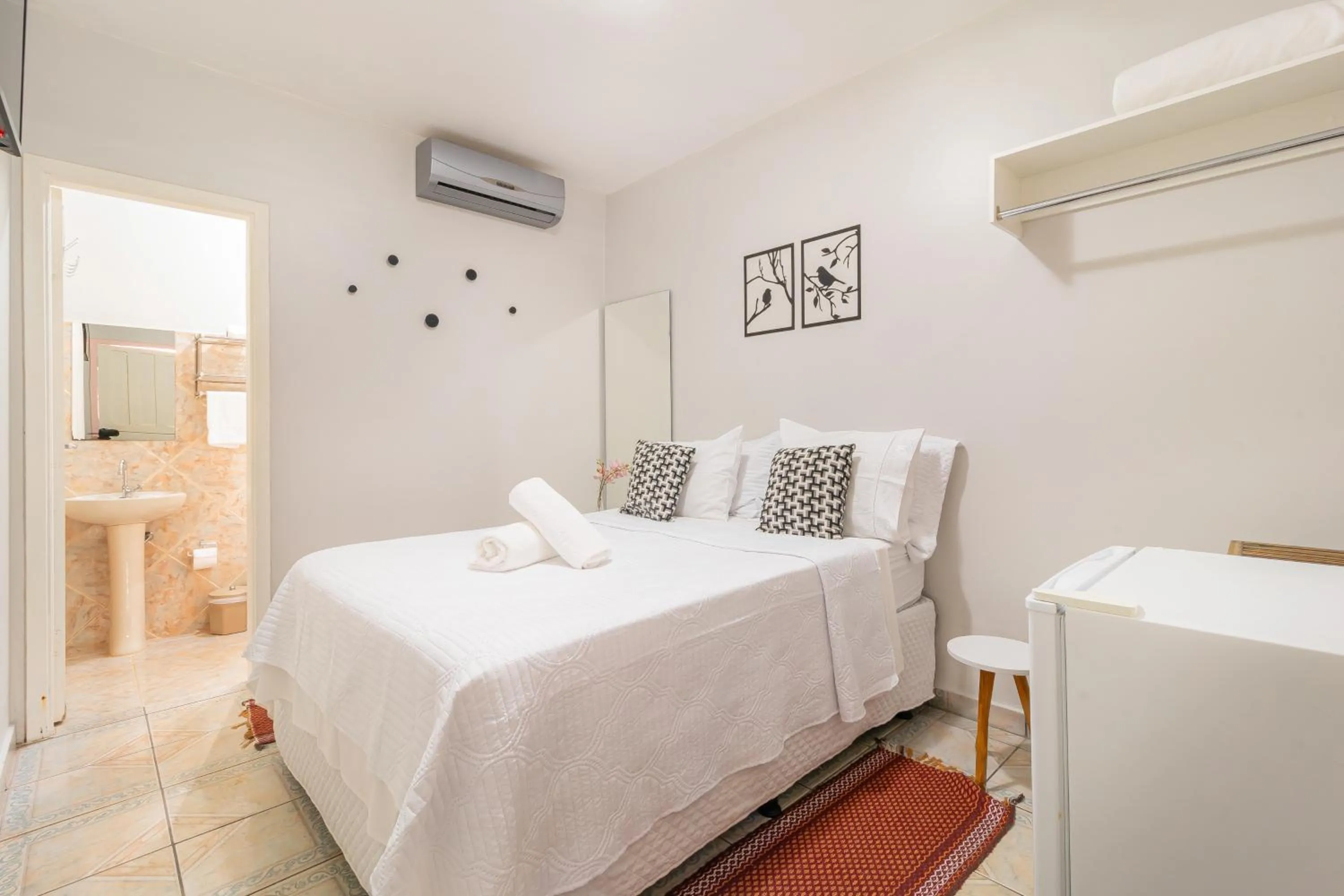 Bed in Pousada Lara