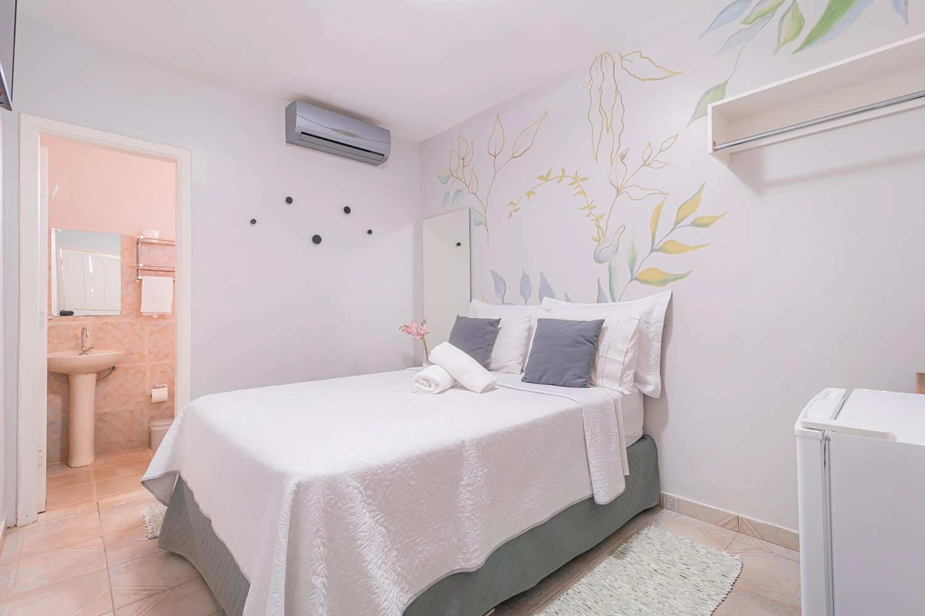 Bed in Pousada Lara