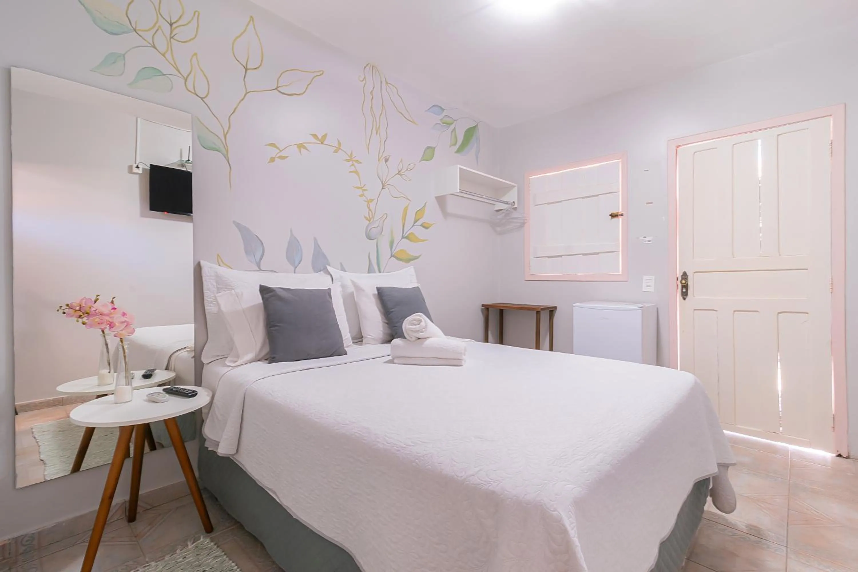 Bed in Pousada Lara