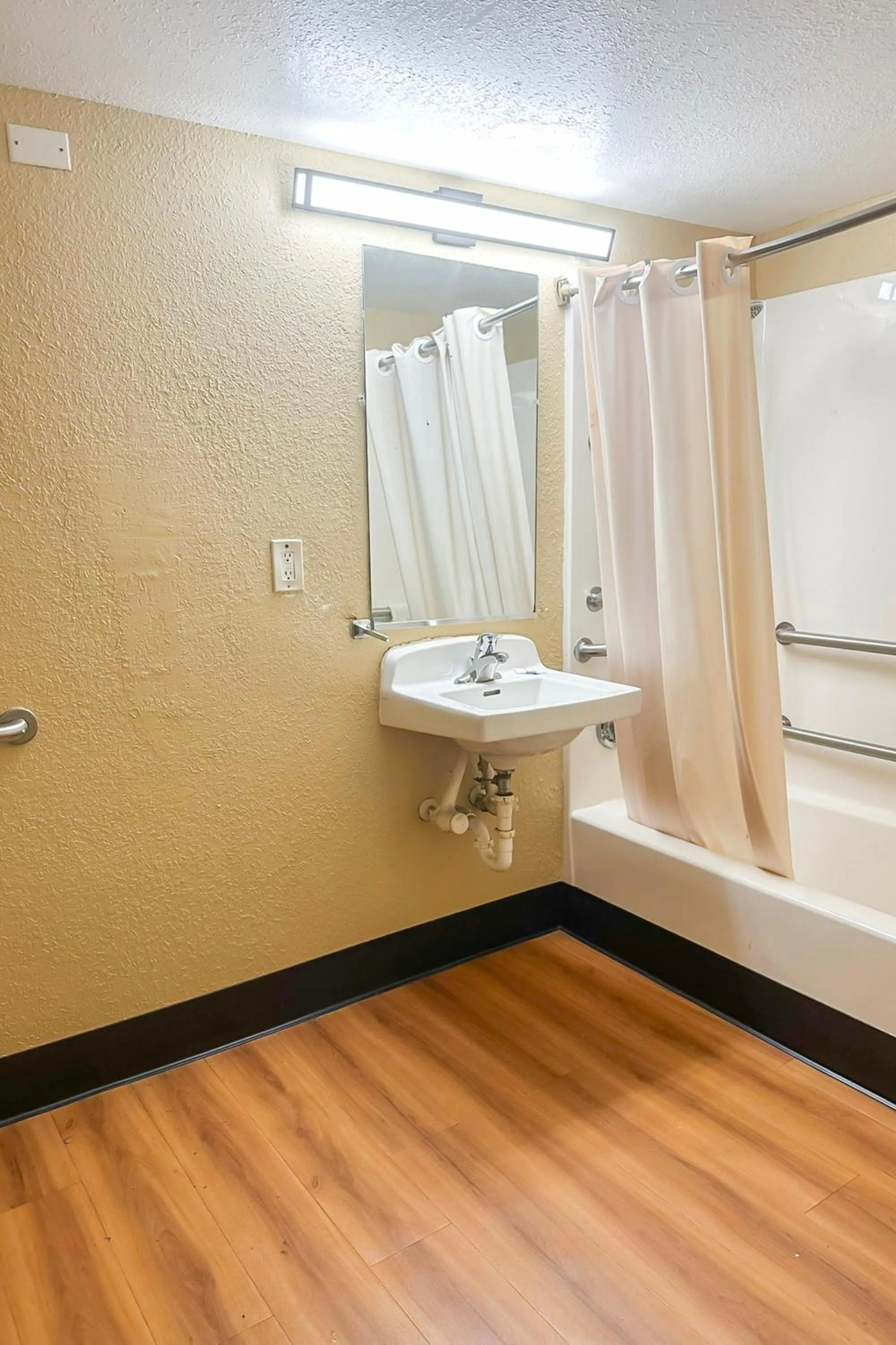 Bathroom in OYO Hotel Mobile, AL I-65 at Airport Blvd