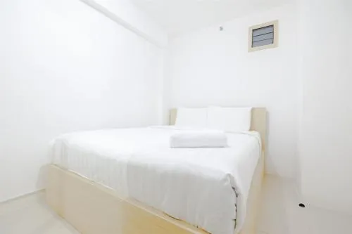 Simply & Clean 2BR Bassura City Apartment By Travelio