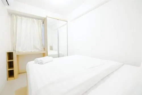 Simply & Clean 2BR Bassura City Apartment By Travelio