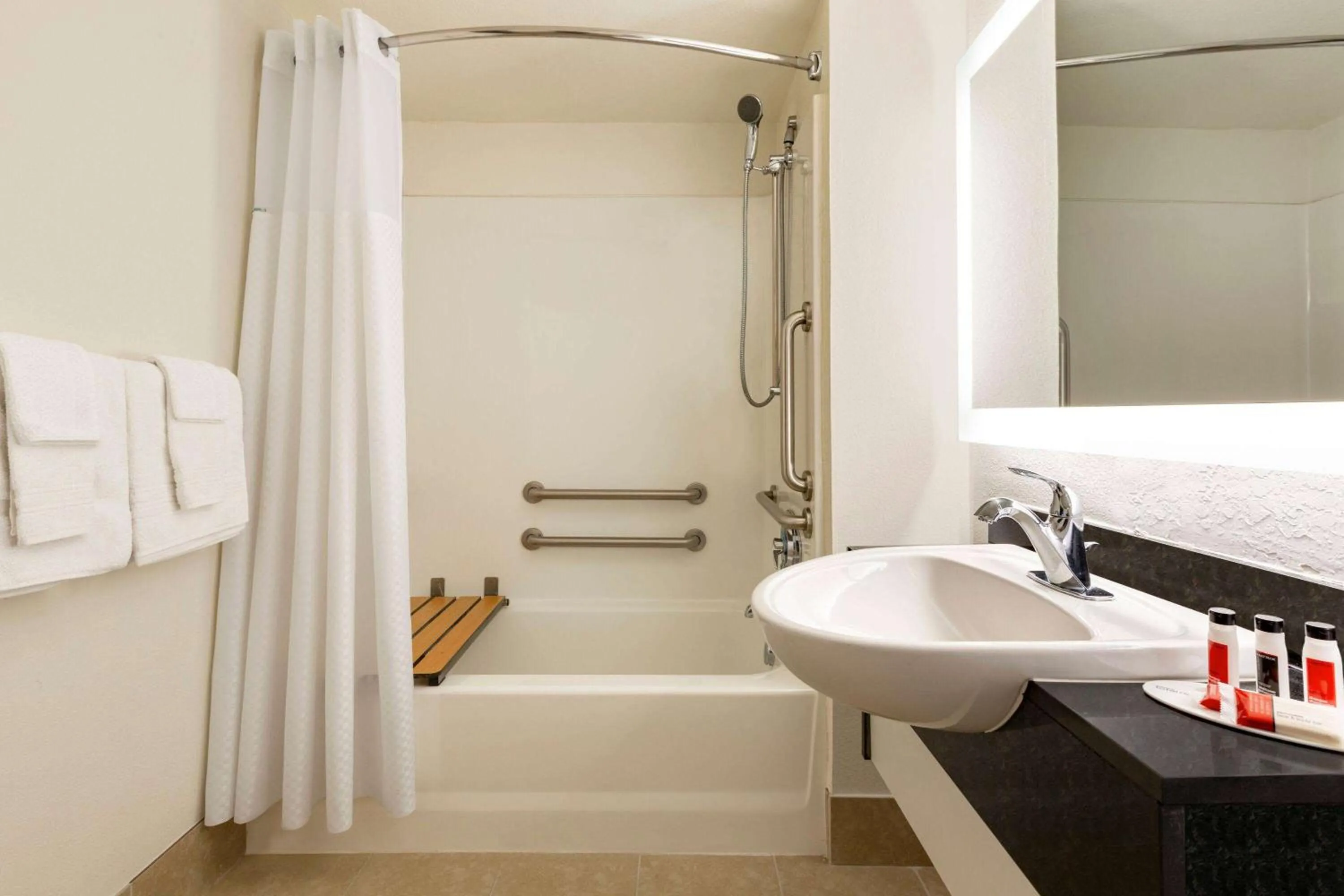 Bathroom in Howard Johnson by Wyndham Harrisonburg