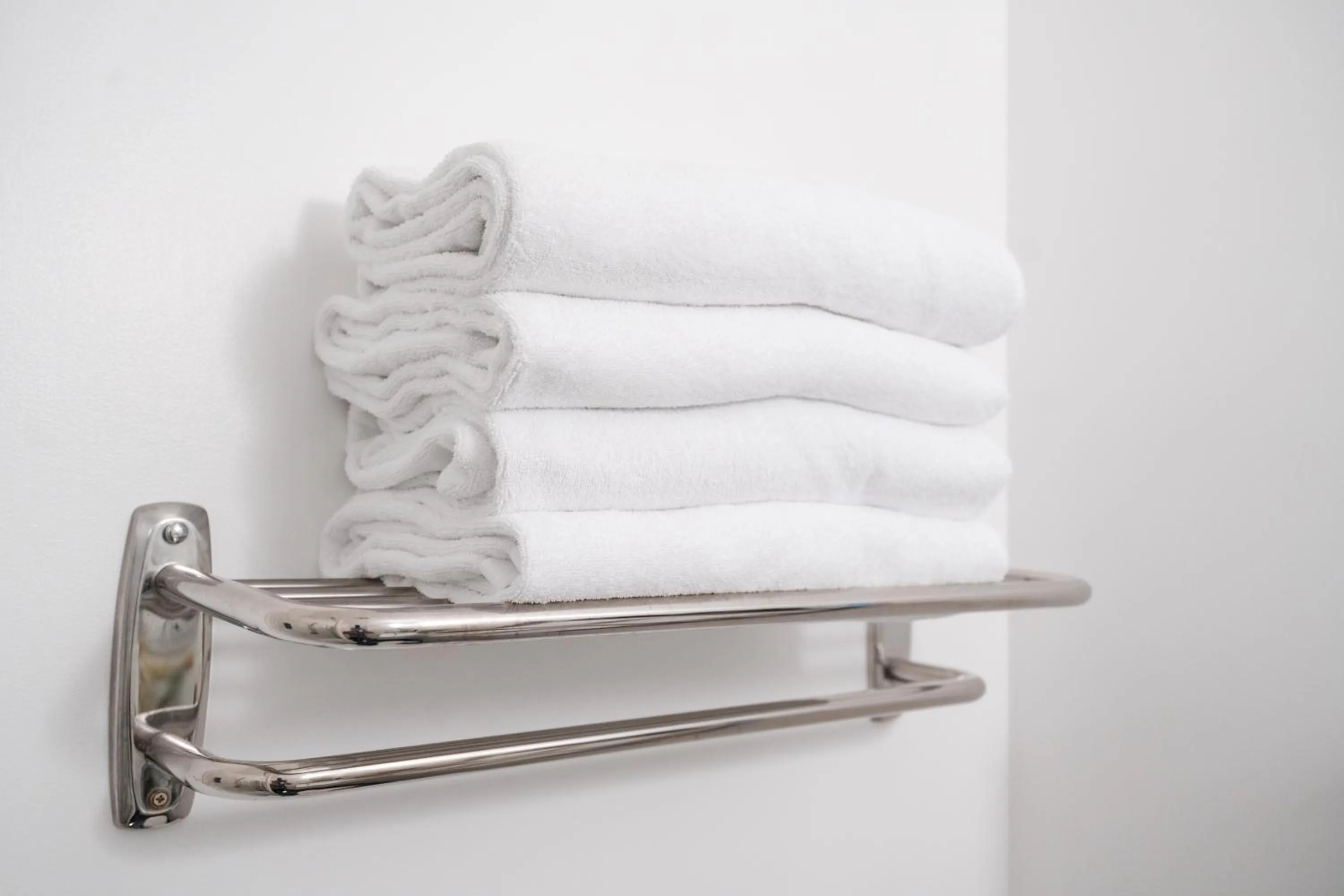 towels, Bed in Gilmer Apartment Hotel