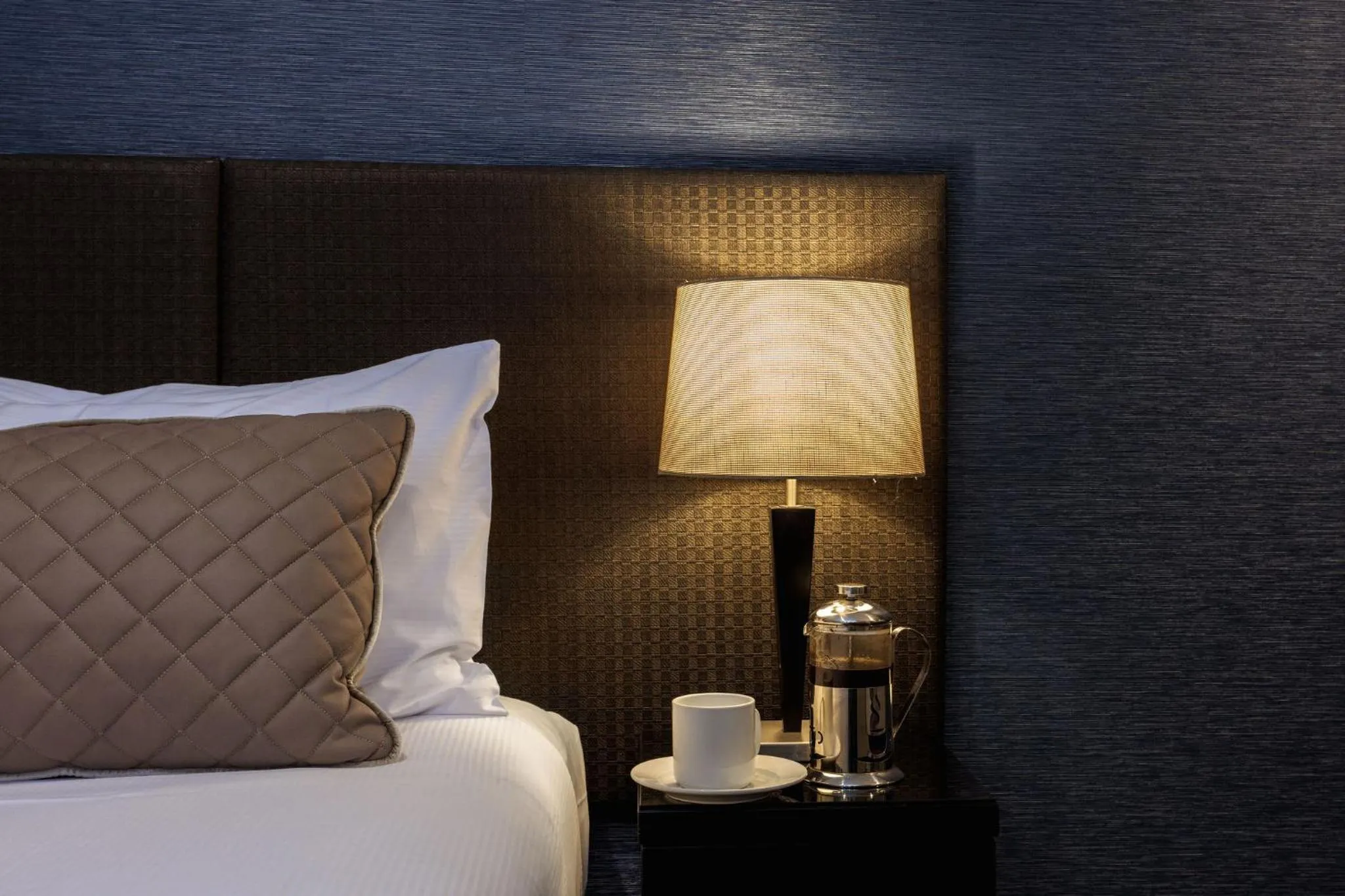 Bed in Gilmer Apartment Hotel