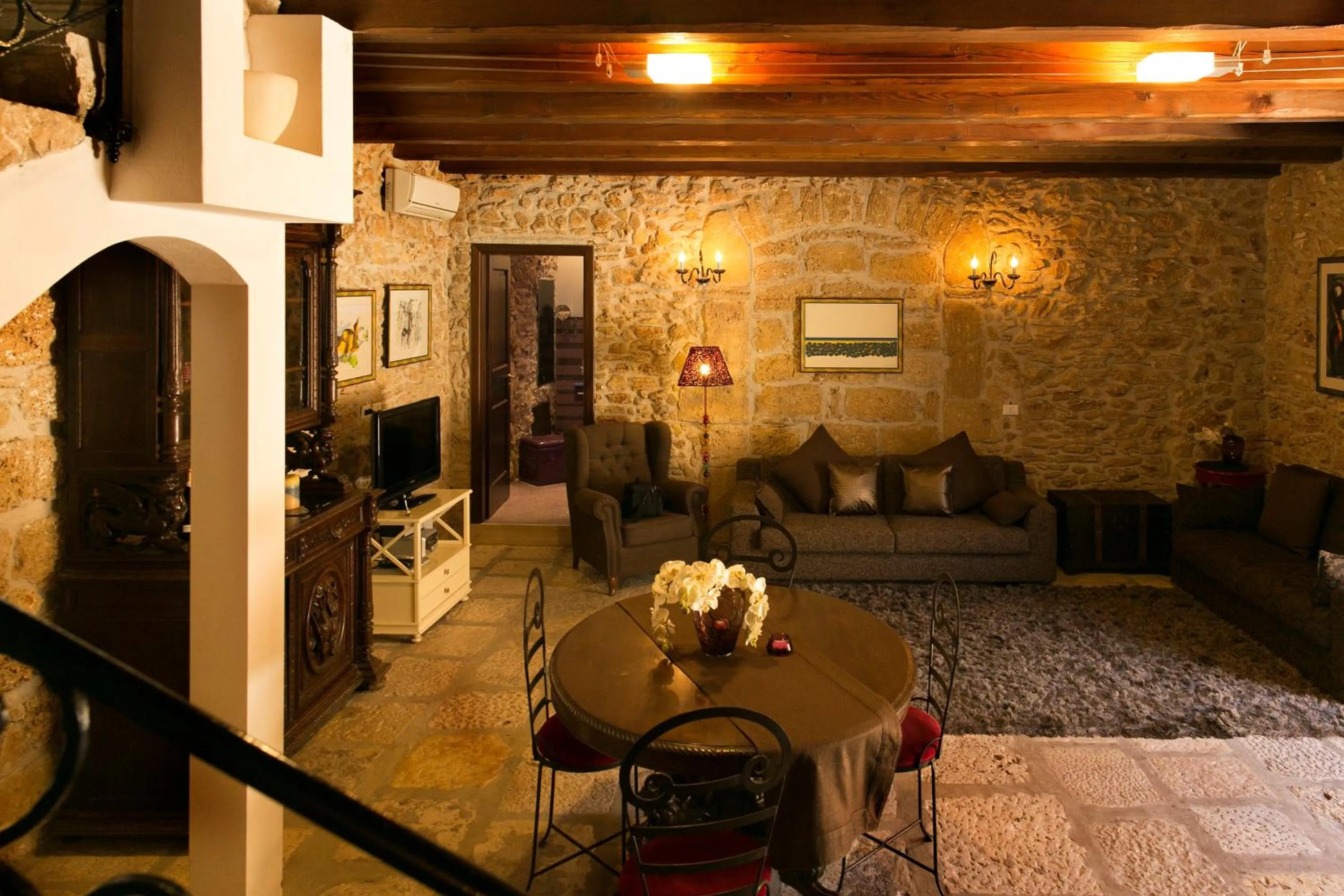 TV and multimedia in Borgo degli Angeli Wellness & Resort by Le Dhome Sicily