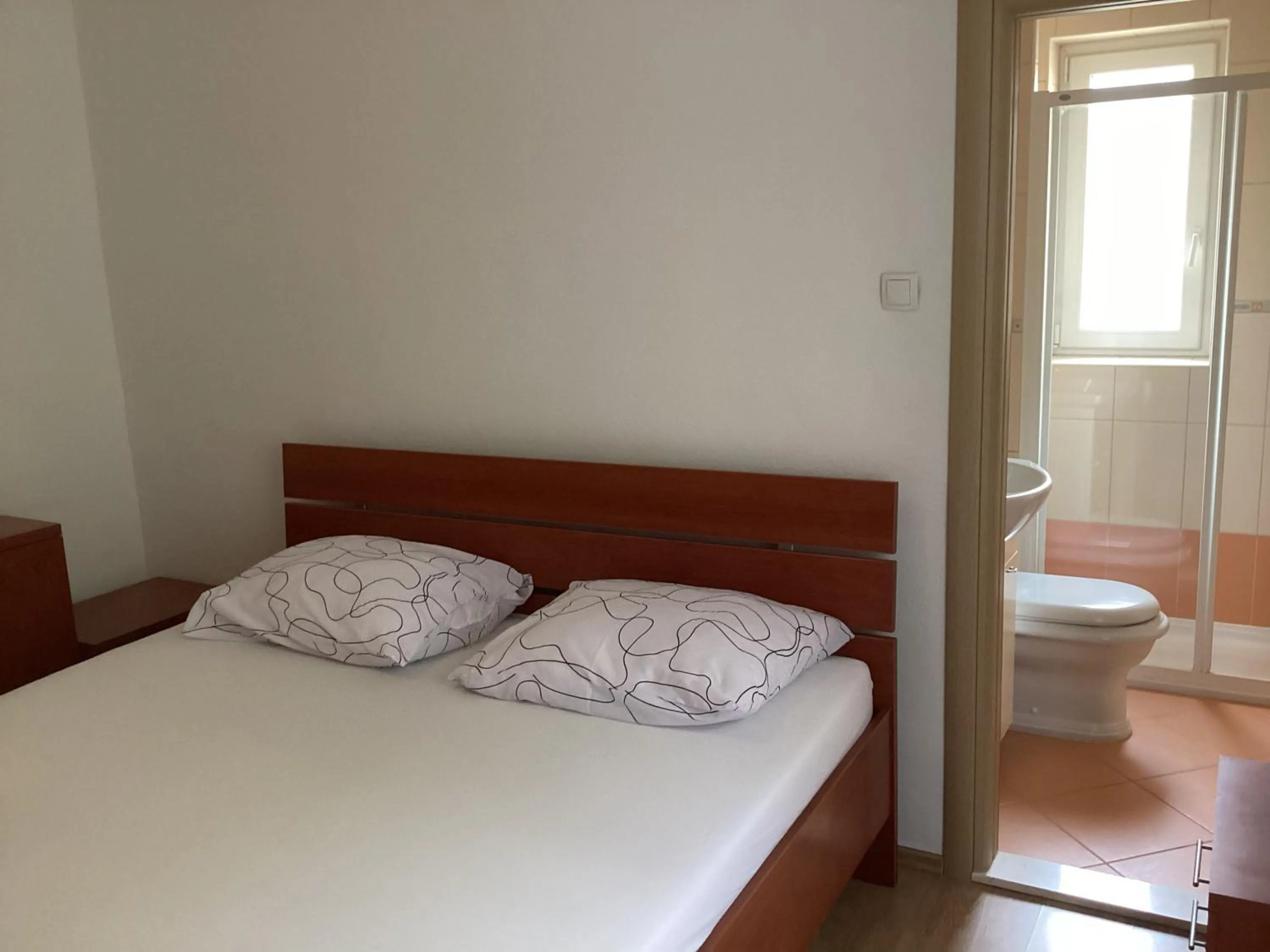 Bed in Apartments Ploka