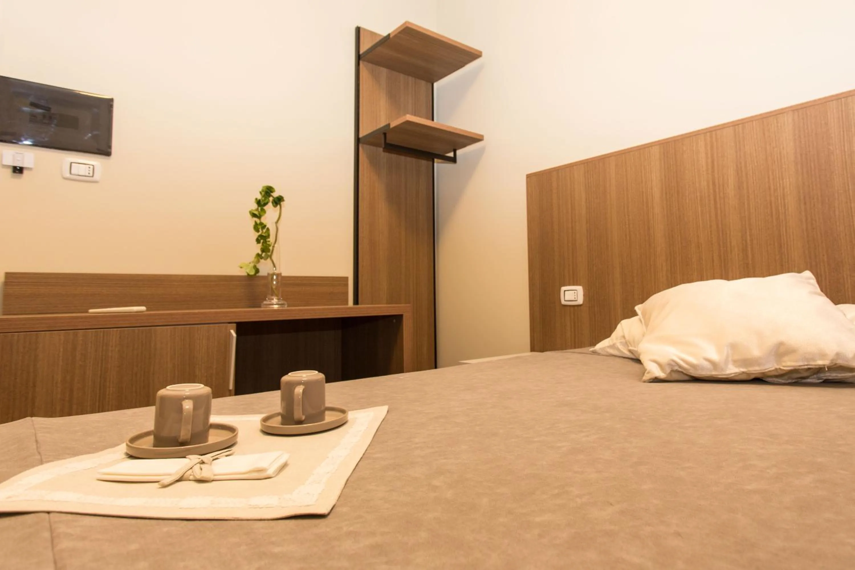 Bed in Le Affacciate Bruzie Home Guest House