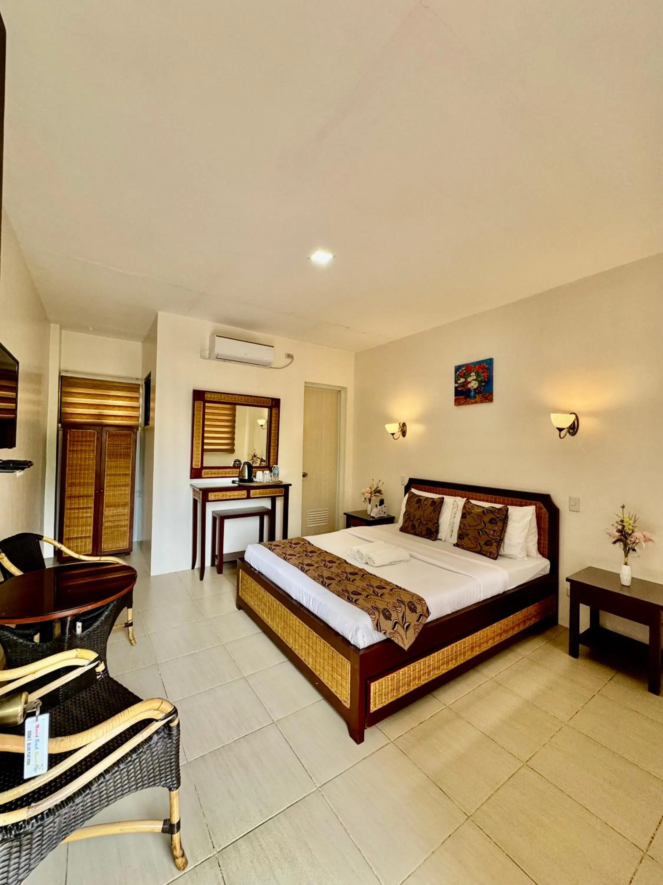 Bed in Marick Beach Resort