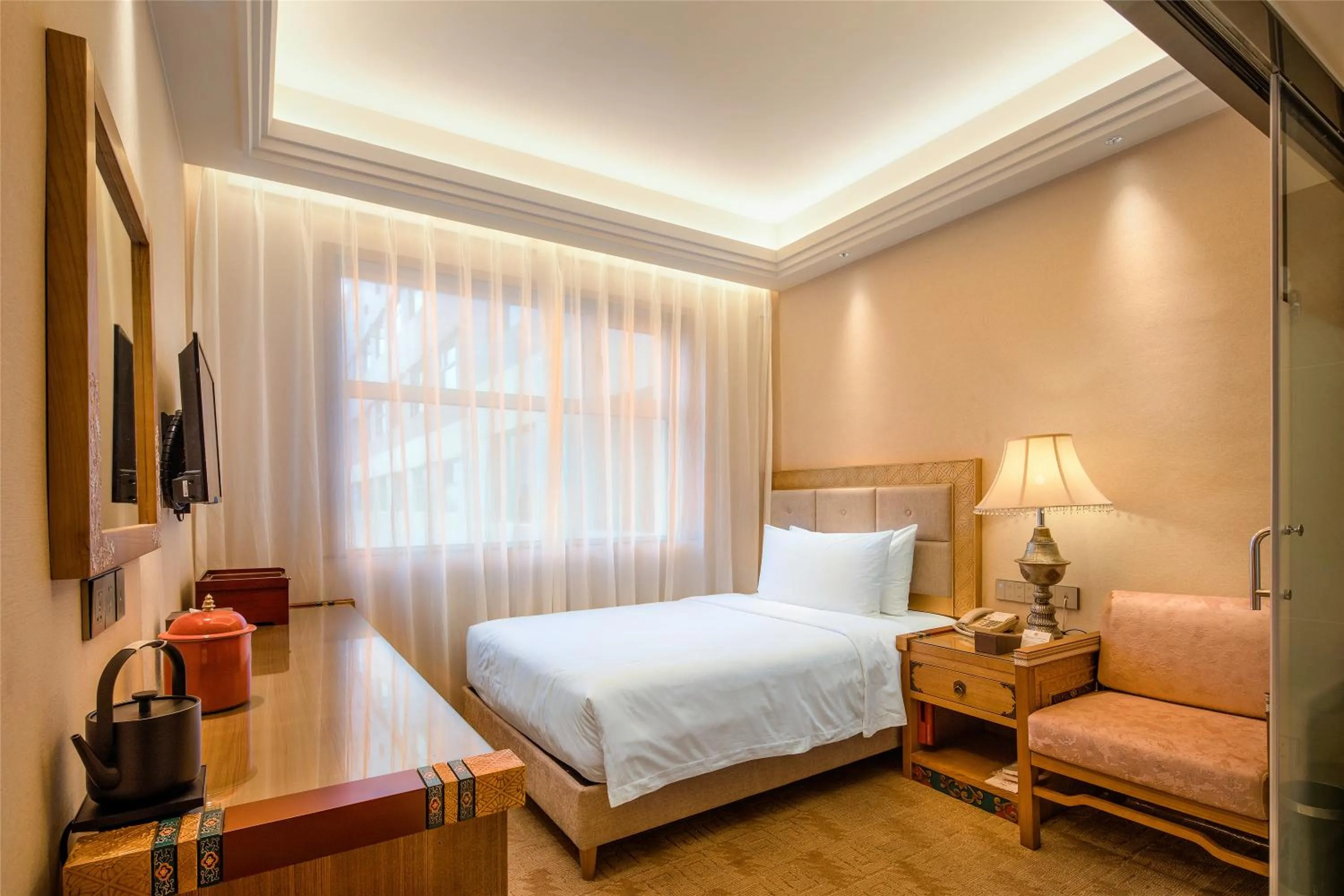 Photo of the whole room, Bed in Chengdu Tibetan Hotel