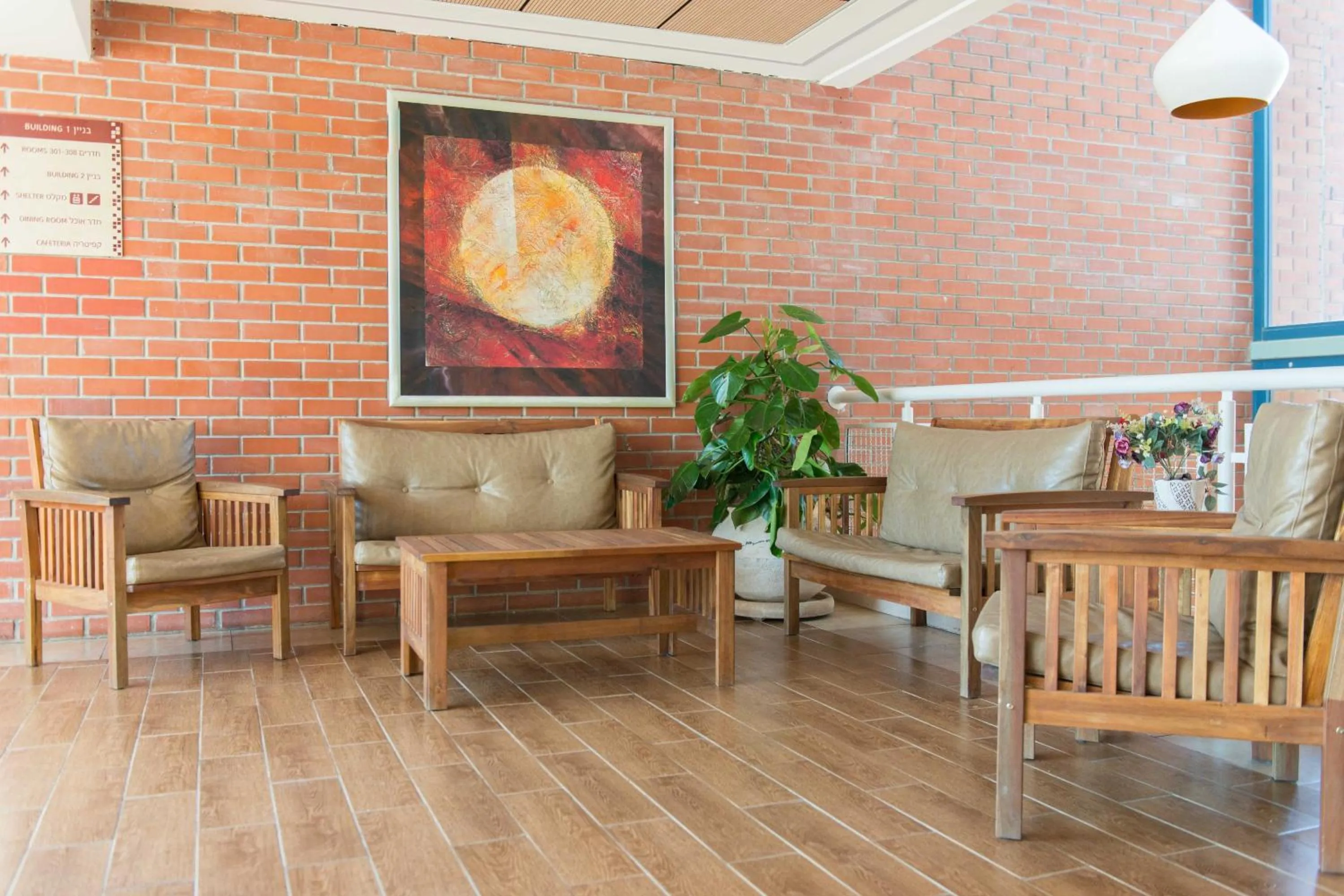 Lobby or reception in HI - Shlomi Hostel