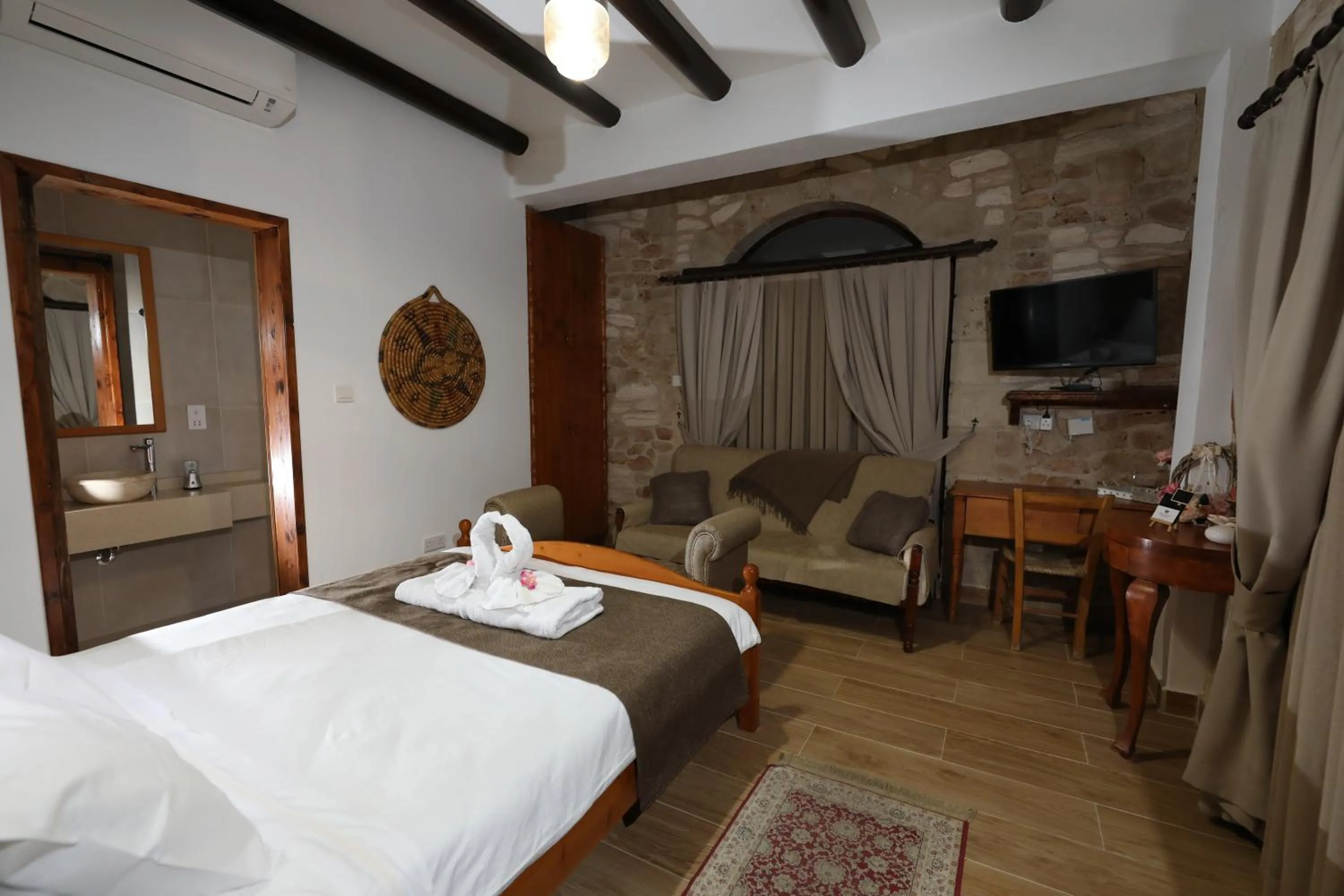 Bed in Hanna Koumi Boutique Hotel