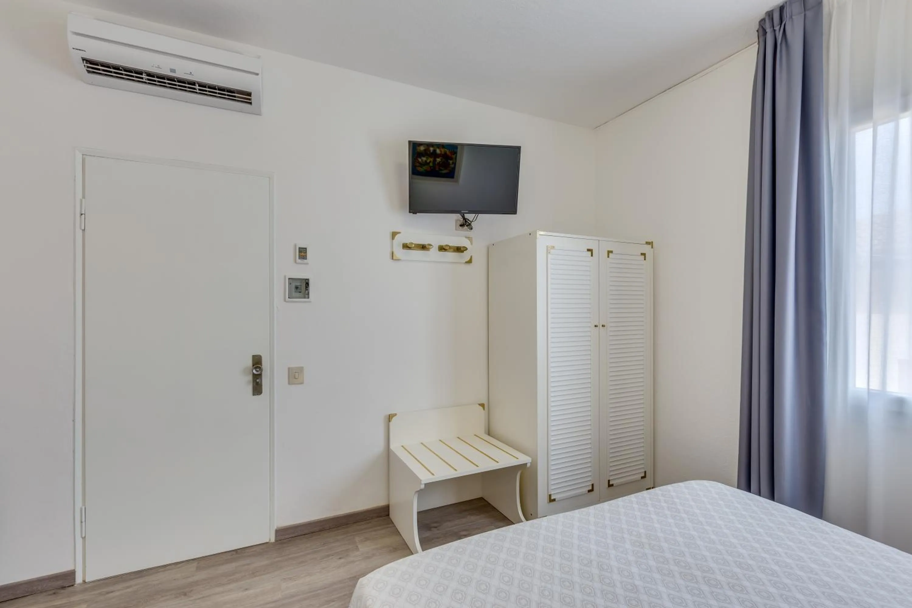 Bedroom in Hotel Garni' Serena