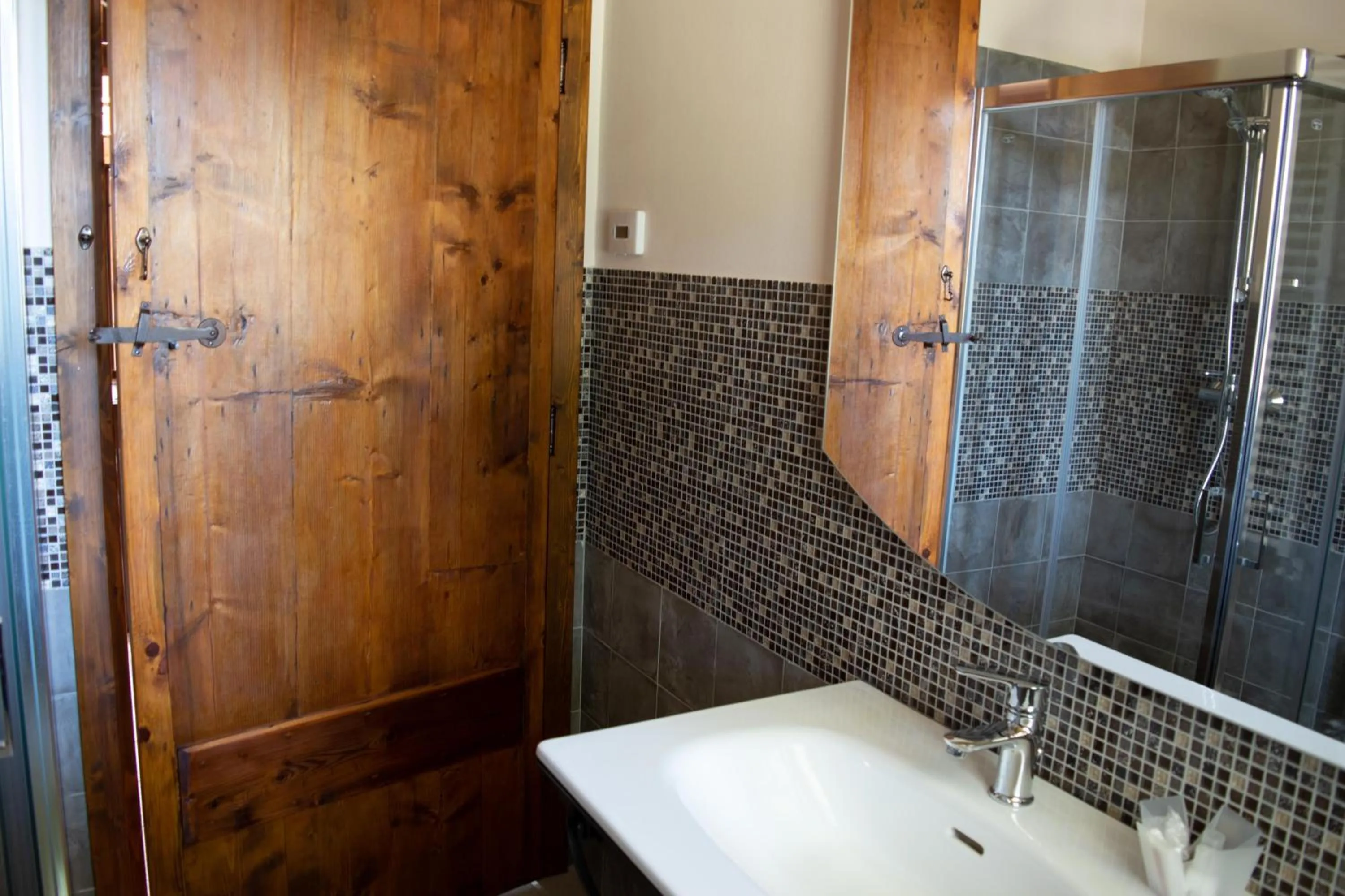 Communal lounge/ TV room in B&B Le Quattro Civette