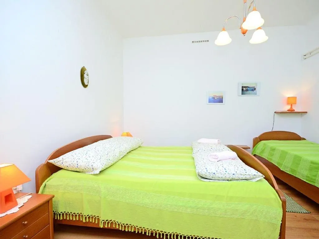 Bed in Apartments Adelmo 1189