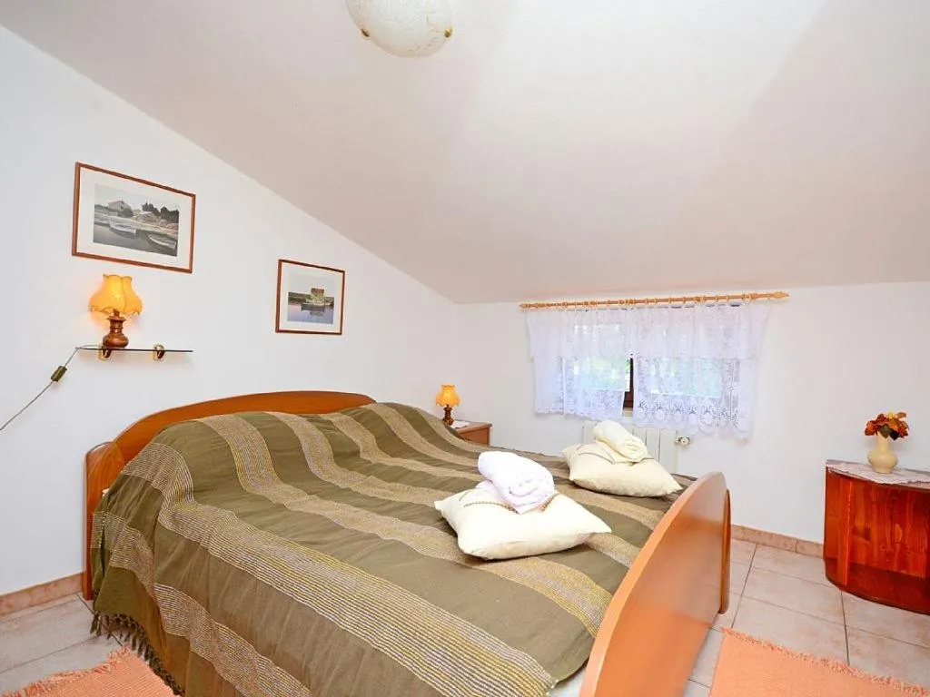 Bed in Apartments Adelmo 1189