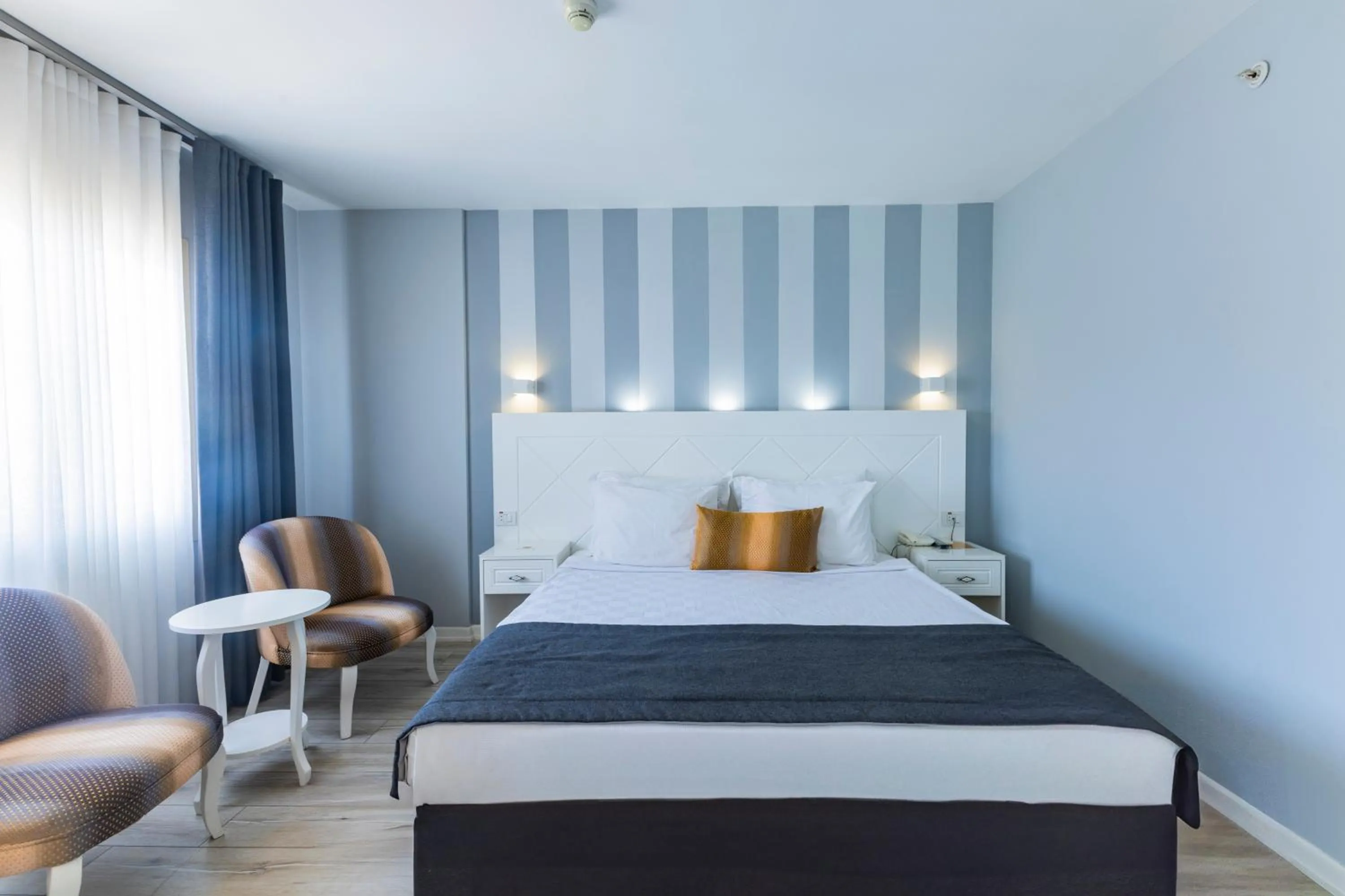 Bed in Motto Premium Hotel&Spa