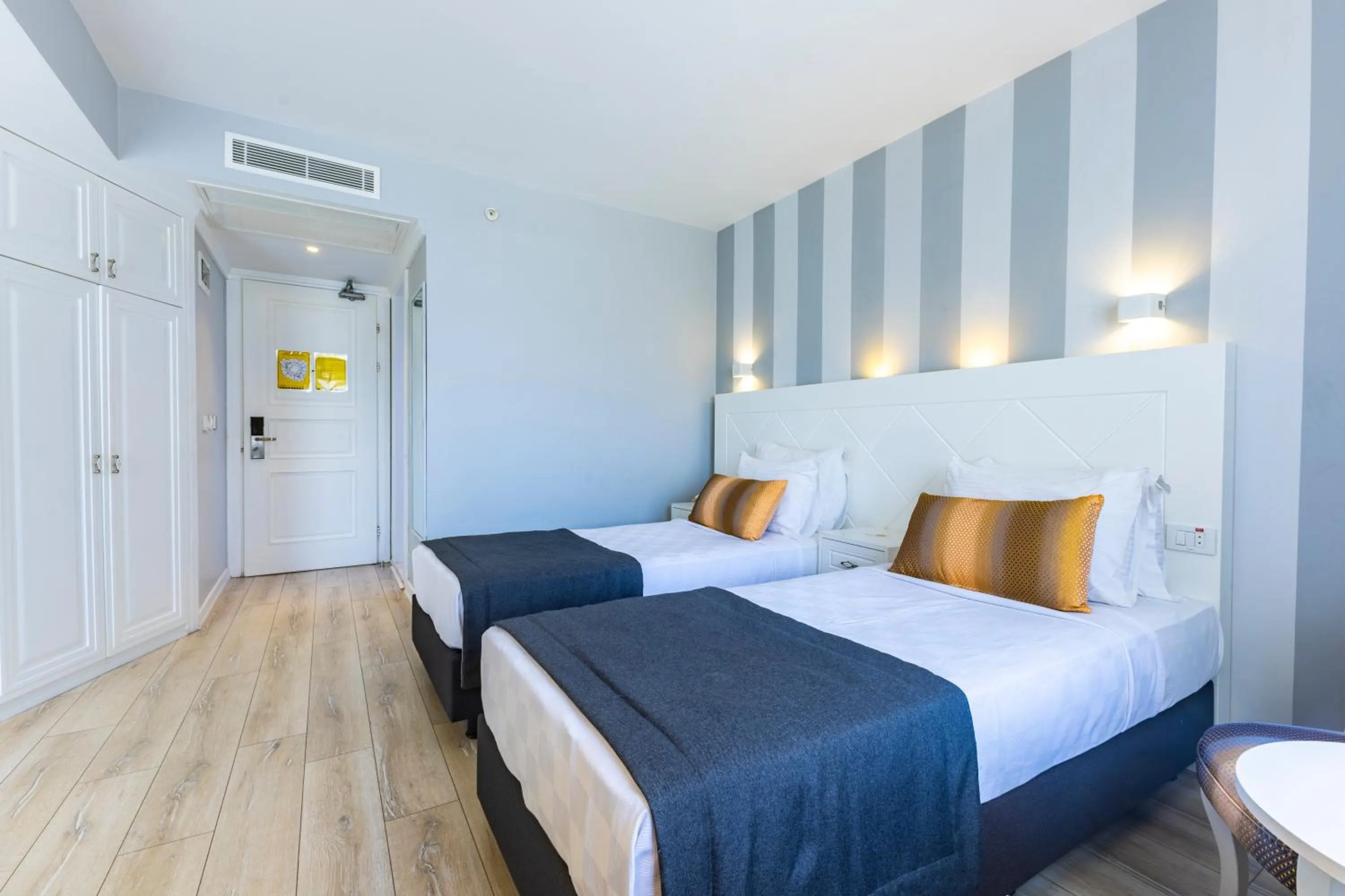 Bed in Motto Premium Hotel&Spa