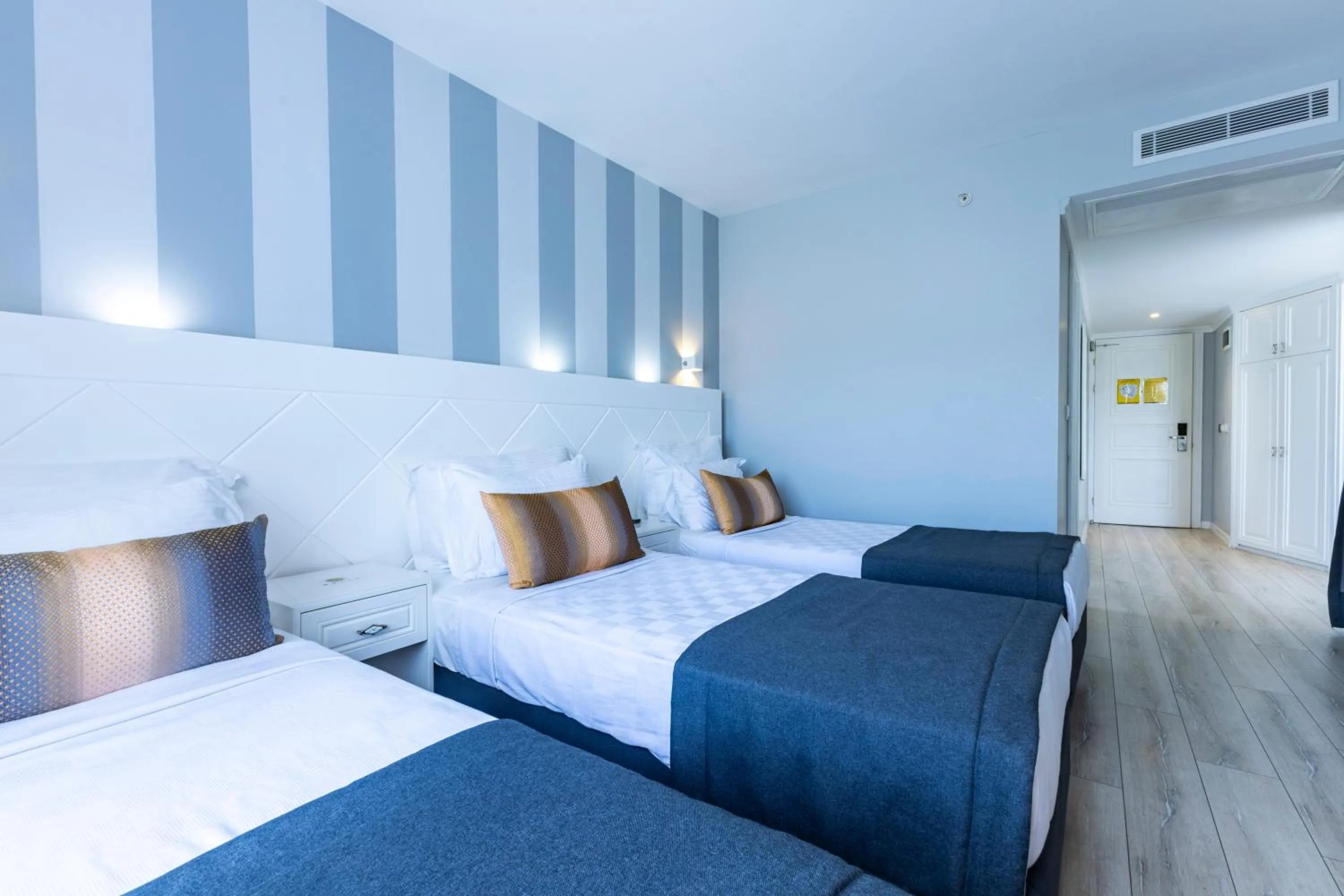 Bed in Motto Premium Hotel&Spa