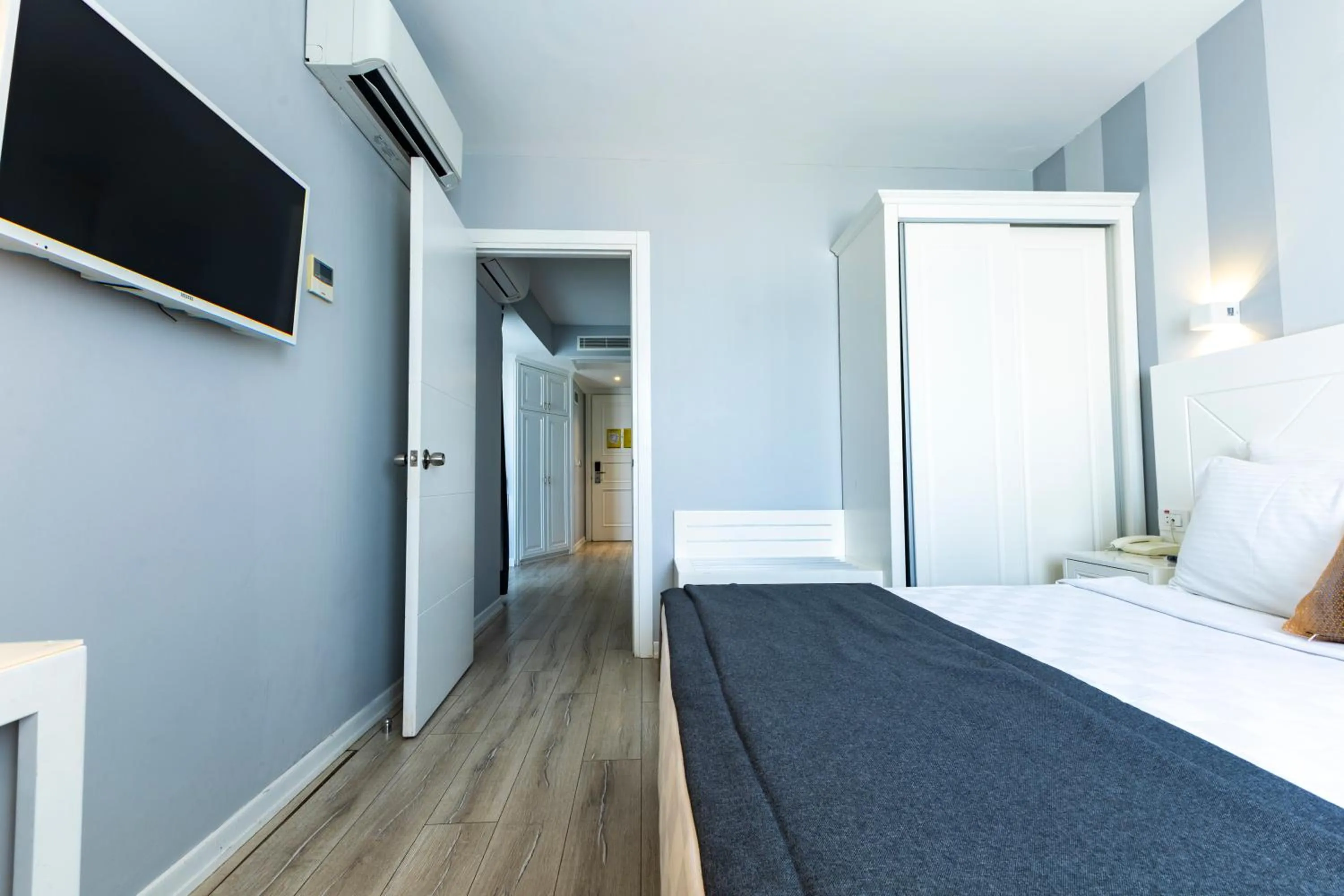 Bed in Motto Premium Hotel&Spa