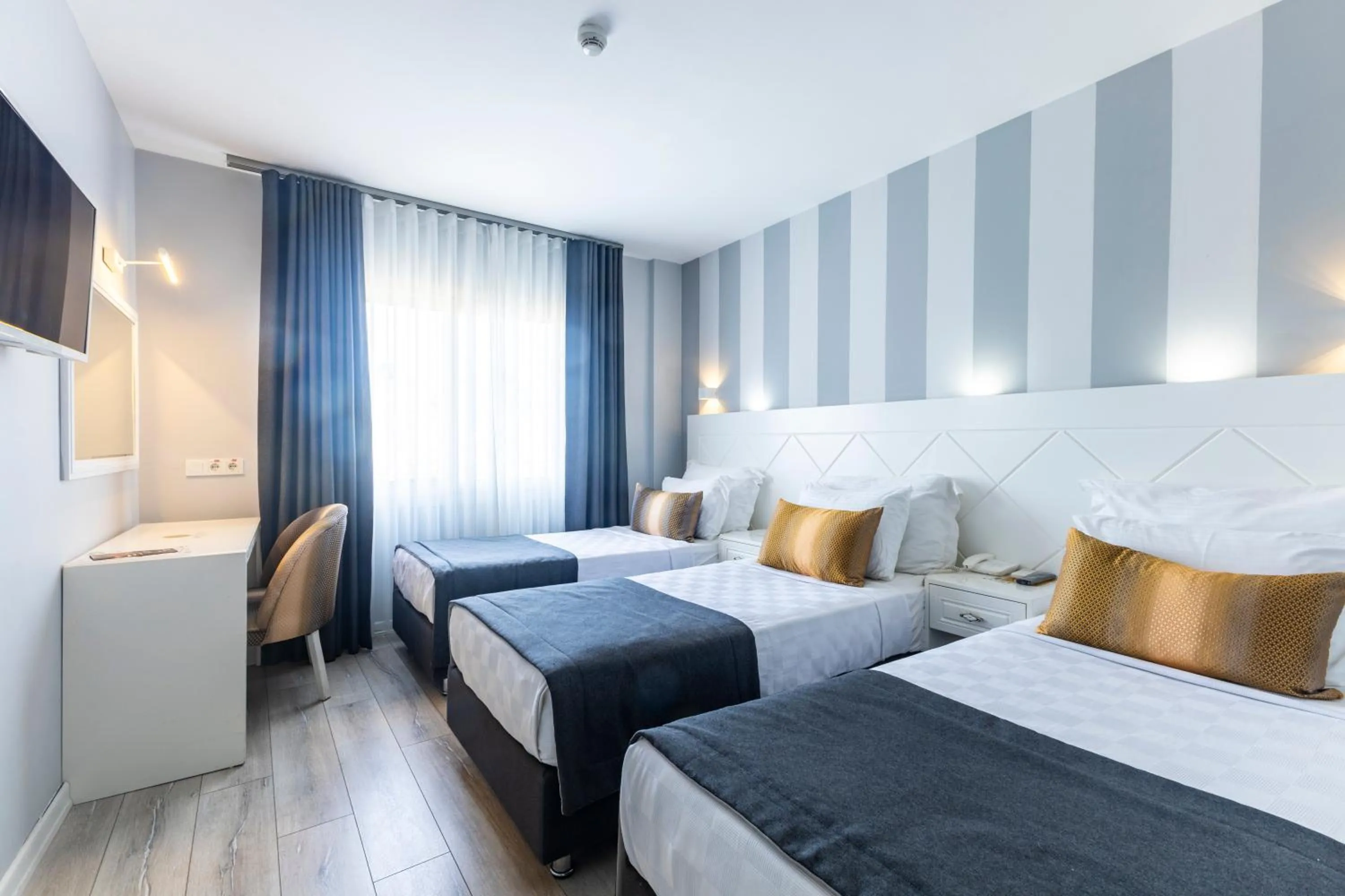 Bed in Motto Premium Hotel&Spa