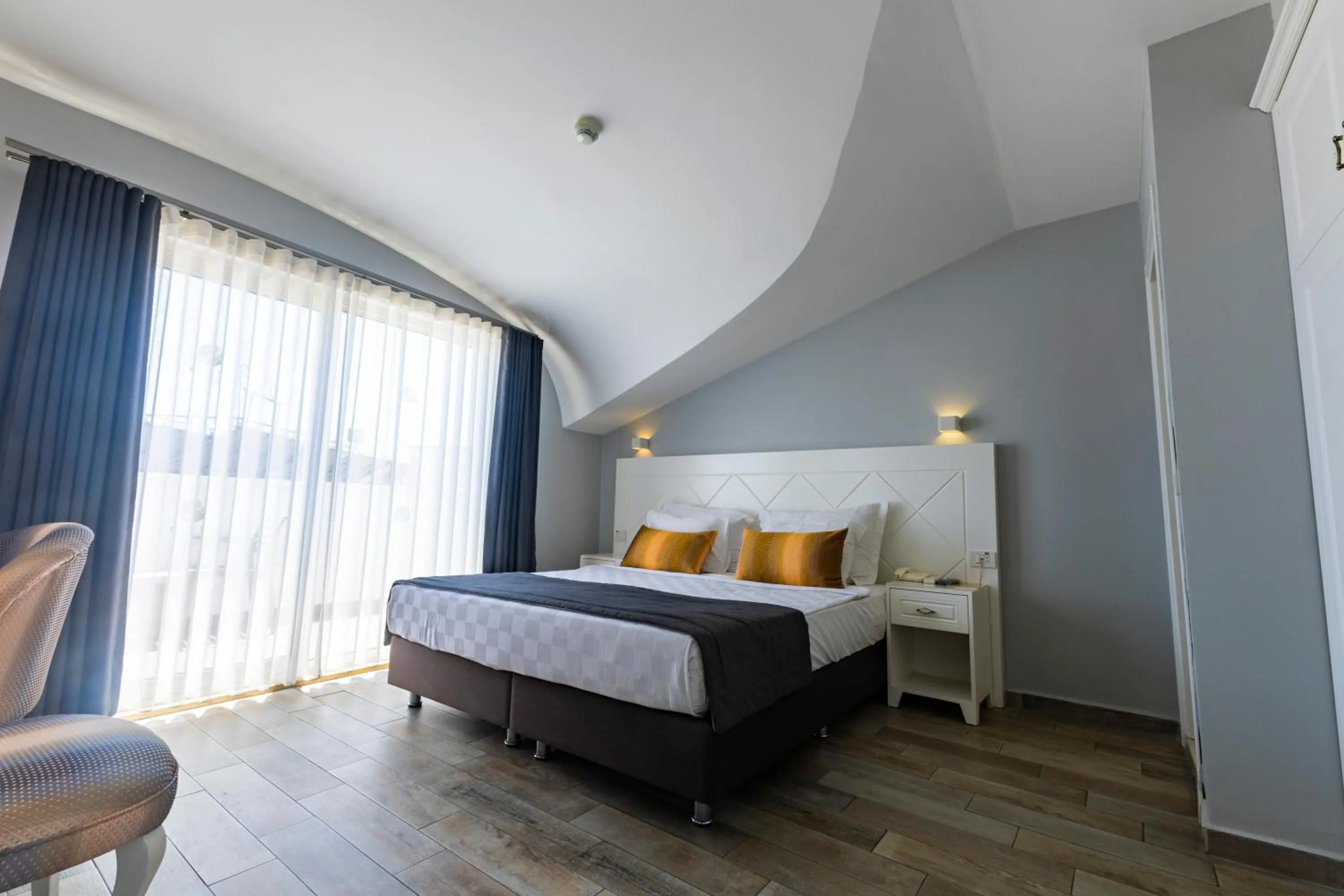 Bed in Motto Premium Hotel&Spa