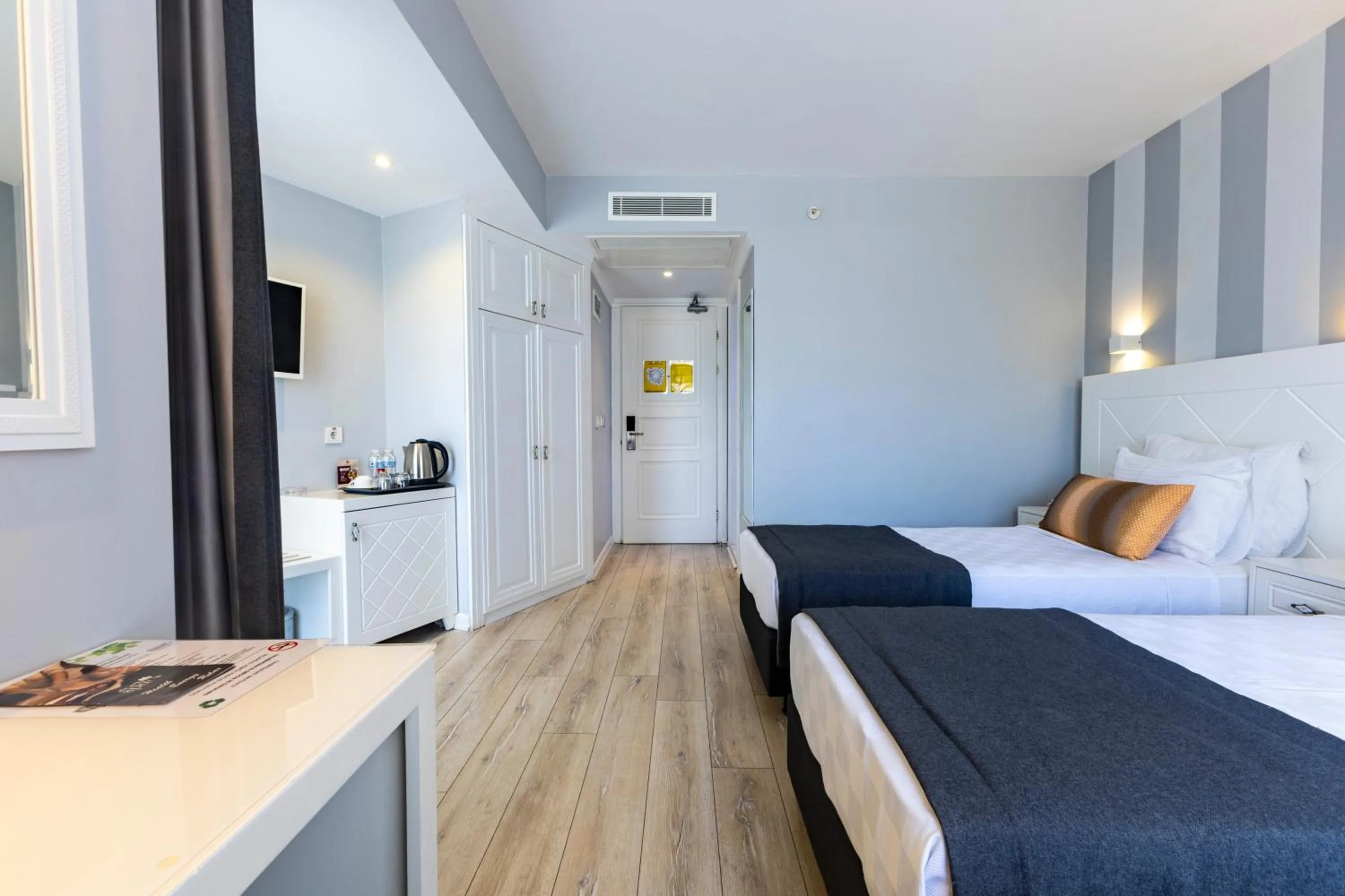 Bed in Motto Premium Hotel&Spa