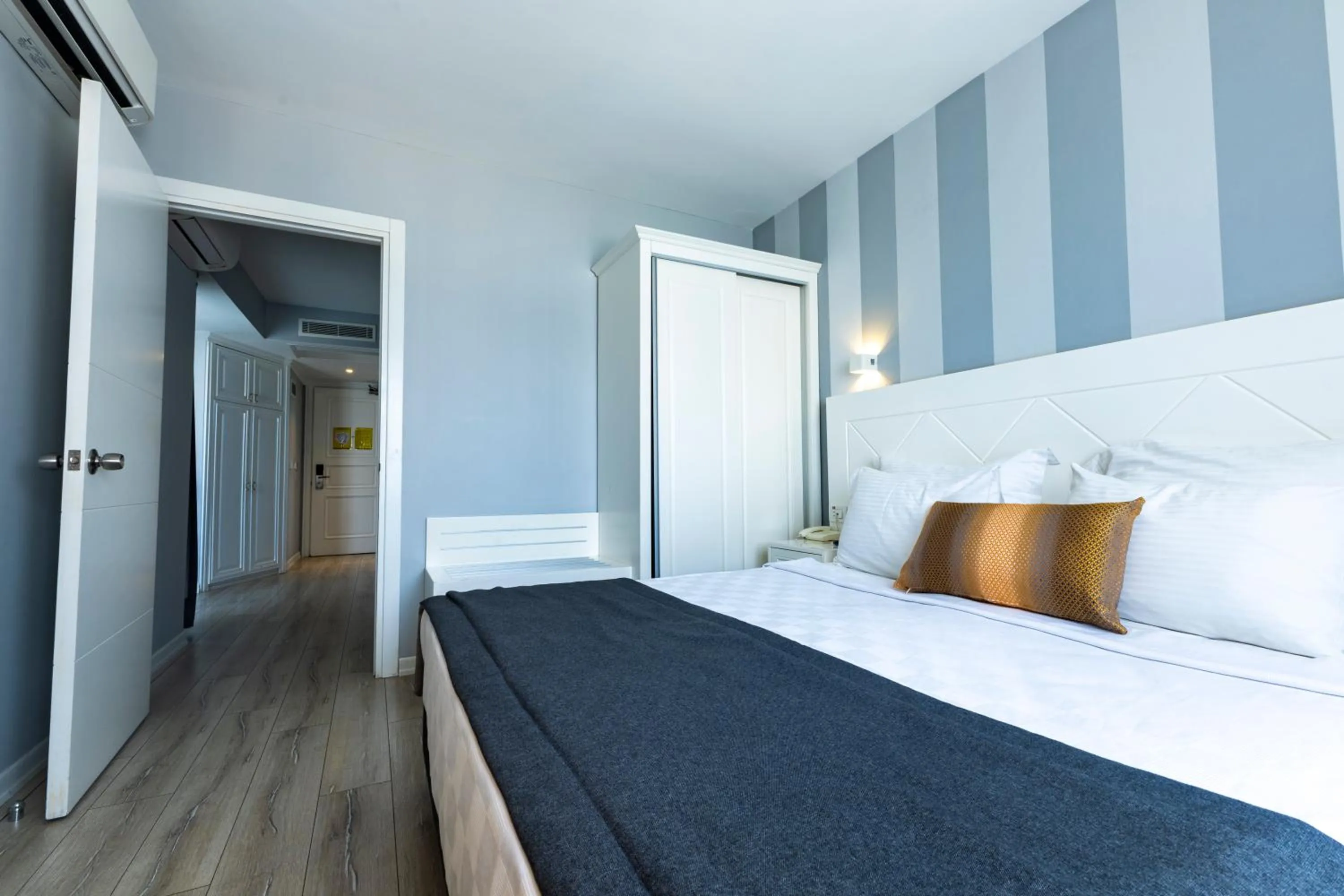 Bed in Motto Premium Hotel&Spa