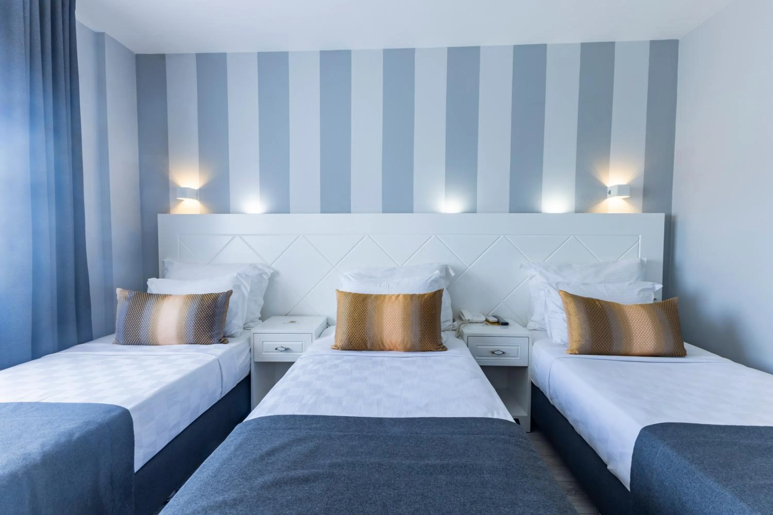 Bed in Motto Premium Hotel&Spa