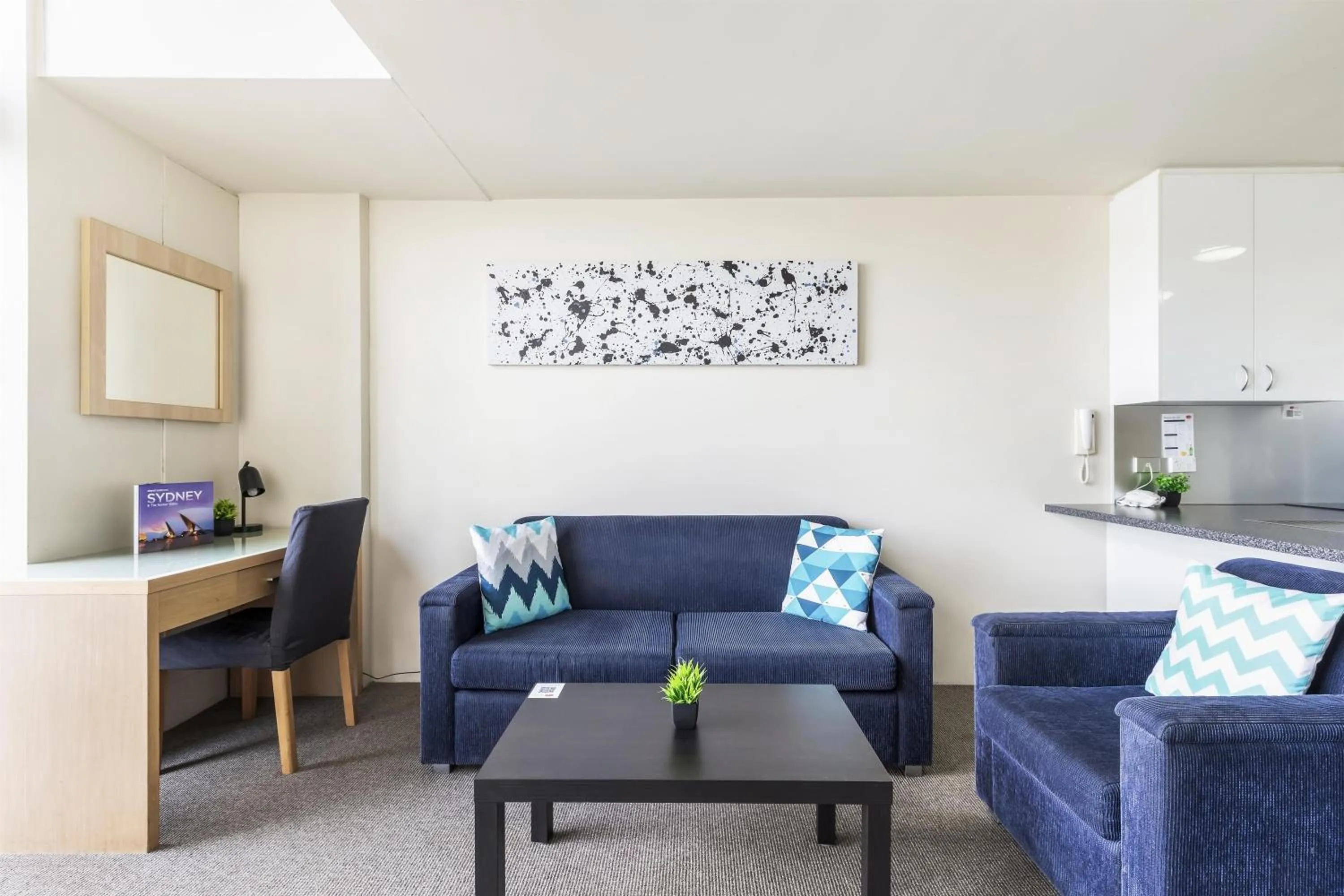 Living room in Metro Apartments on Darling Harbour