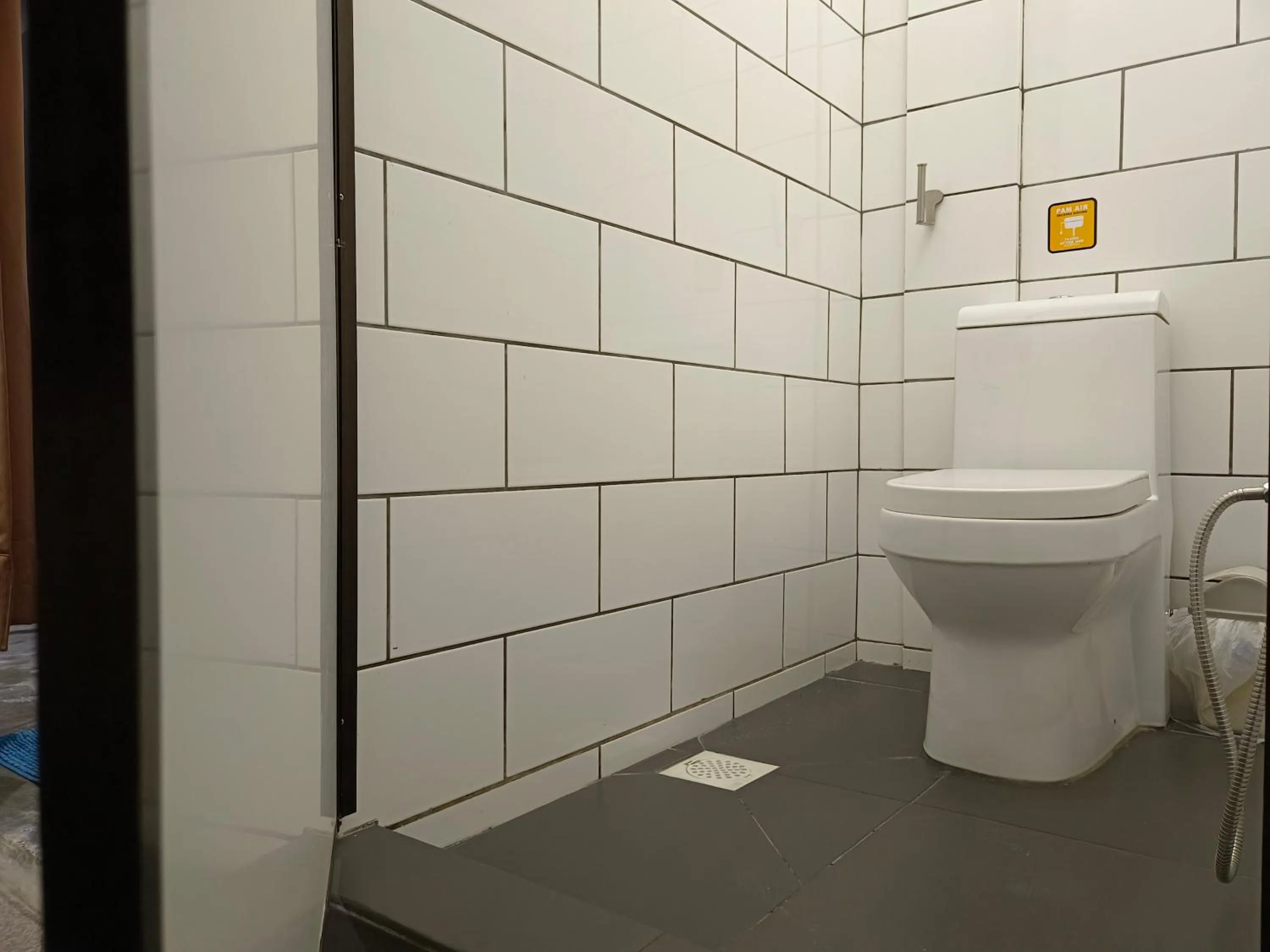 Toilet in Beds In Garden Hostel