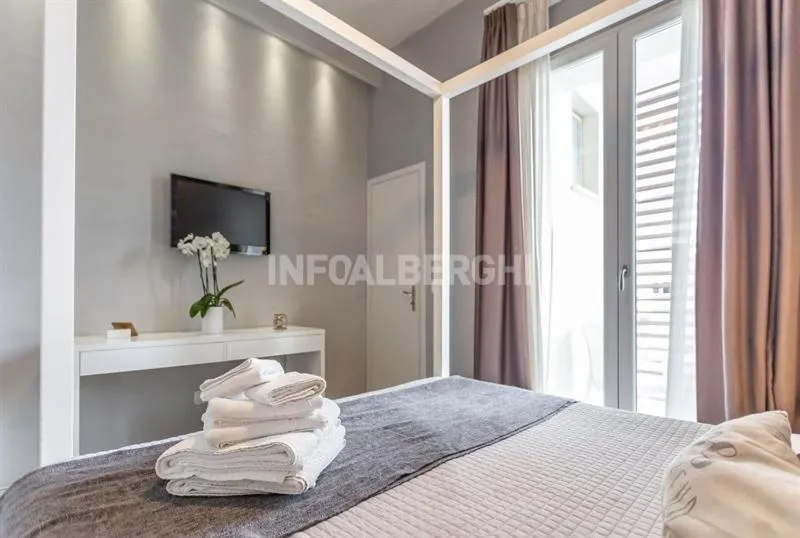 Bed in Albergo Aquila