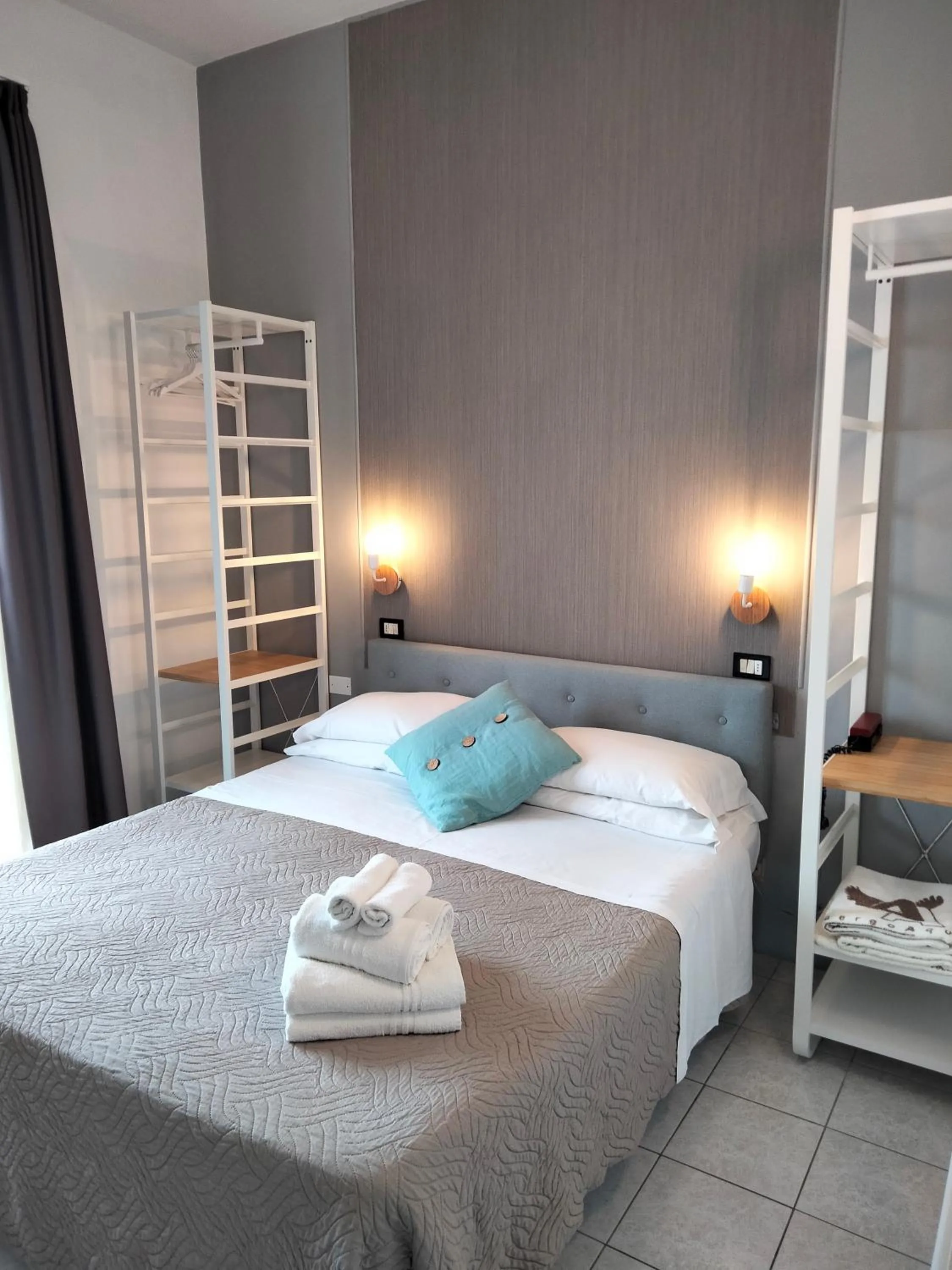 Bed in Albergo Aquila