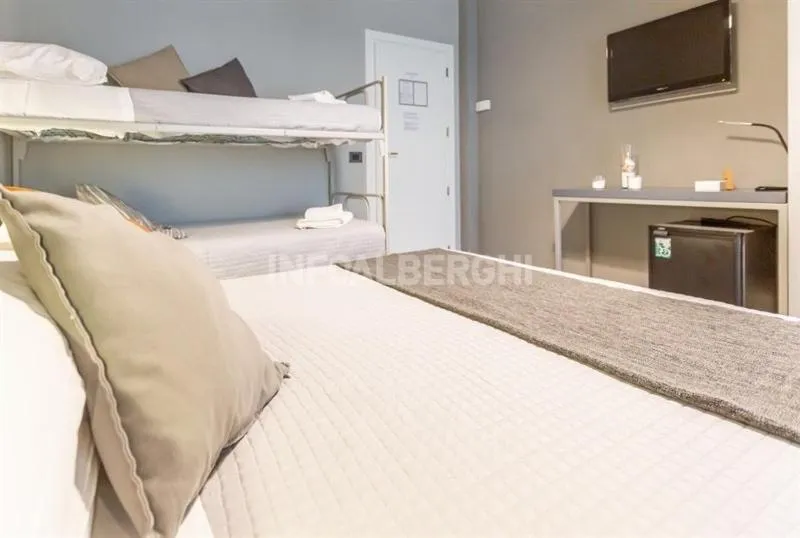 Bed in Albergo Aquila