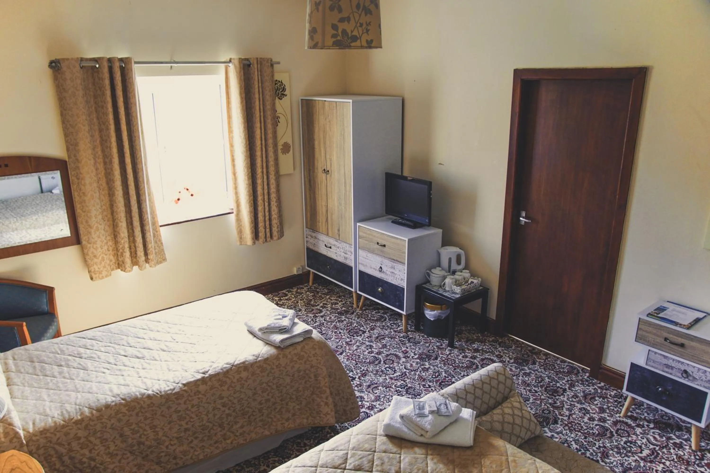 Bed in Abbey Grange Hotel