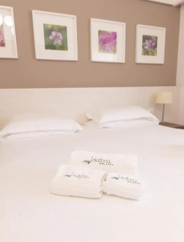 Bed in Biafora Resort & Spa