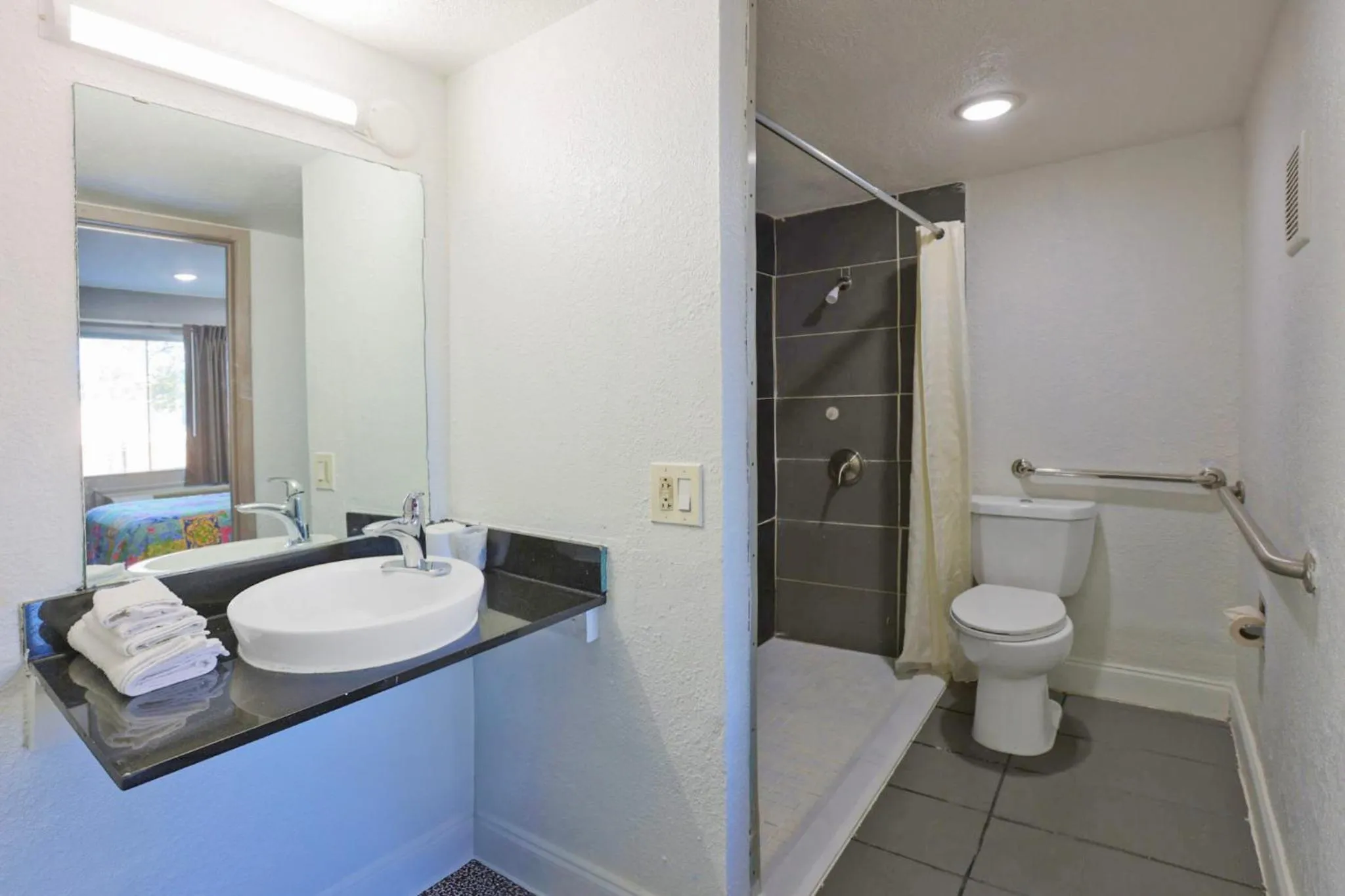 Bathroom in Super 7 Inn by Hotel O Dallas I 20