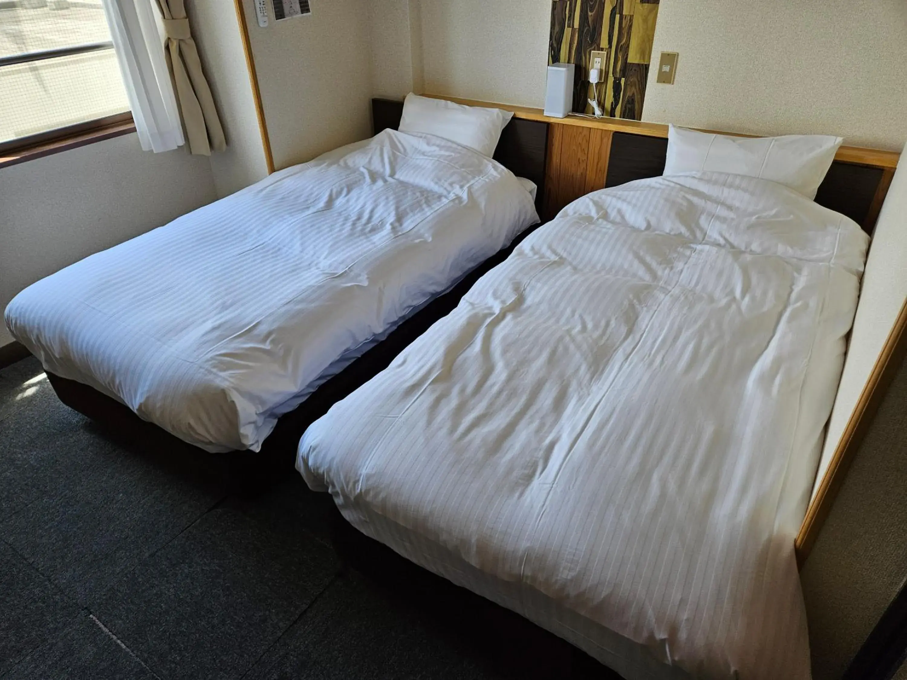 Bed in Plaza Inn Kawaguchiko Bed in Plaza Inn Kawaguchiko