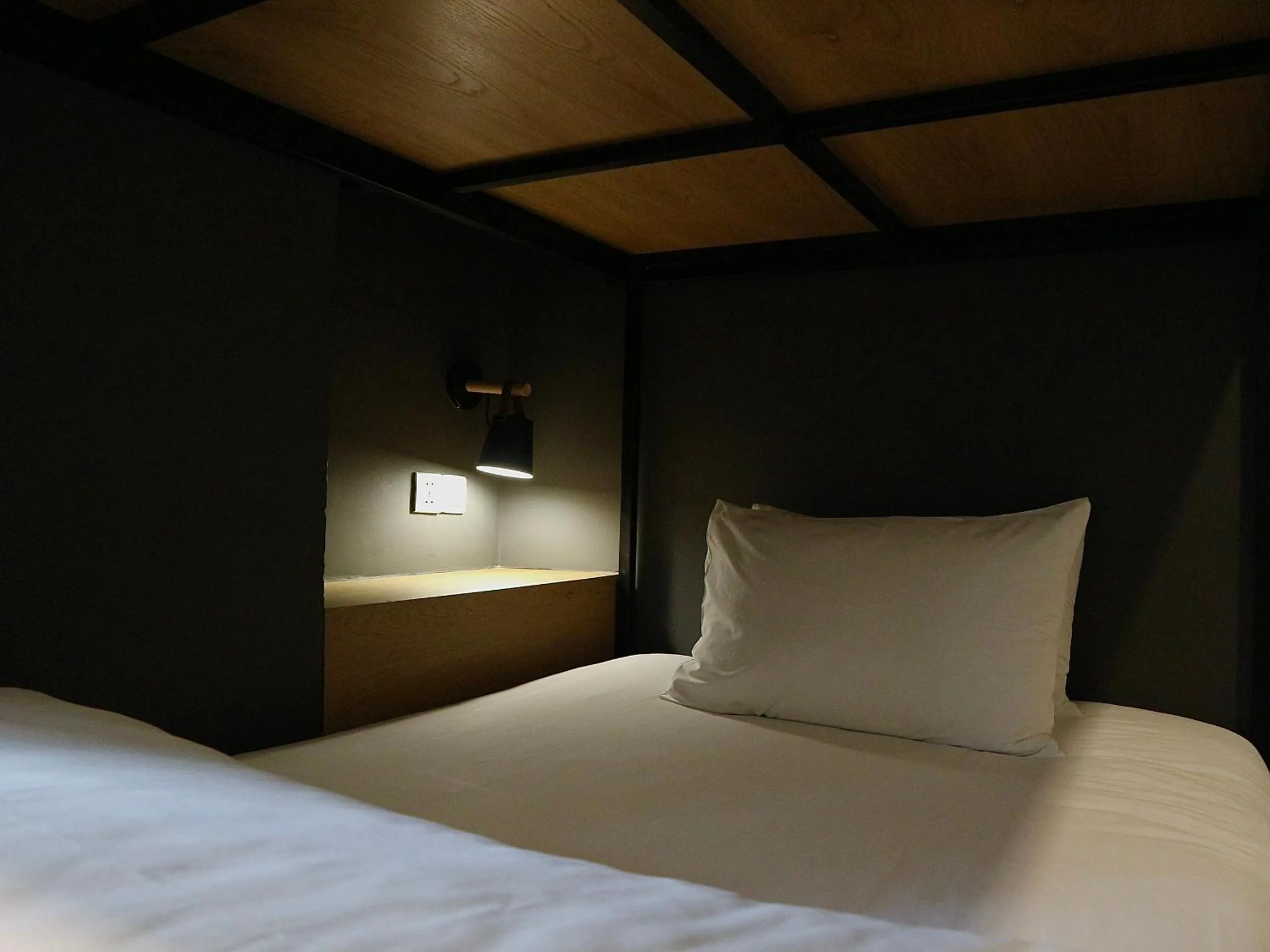 Bed in The Hammock Hotel Fine Arts Museum