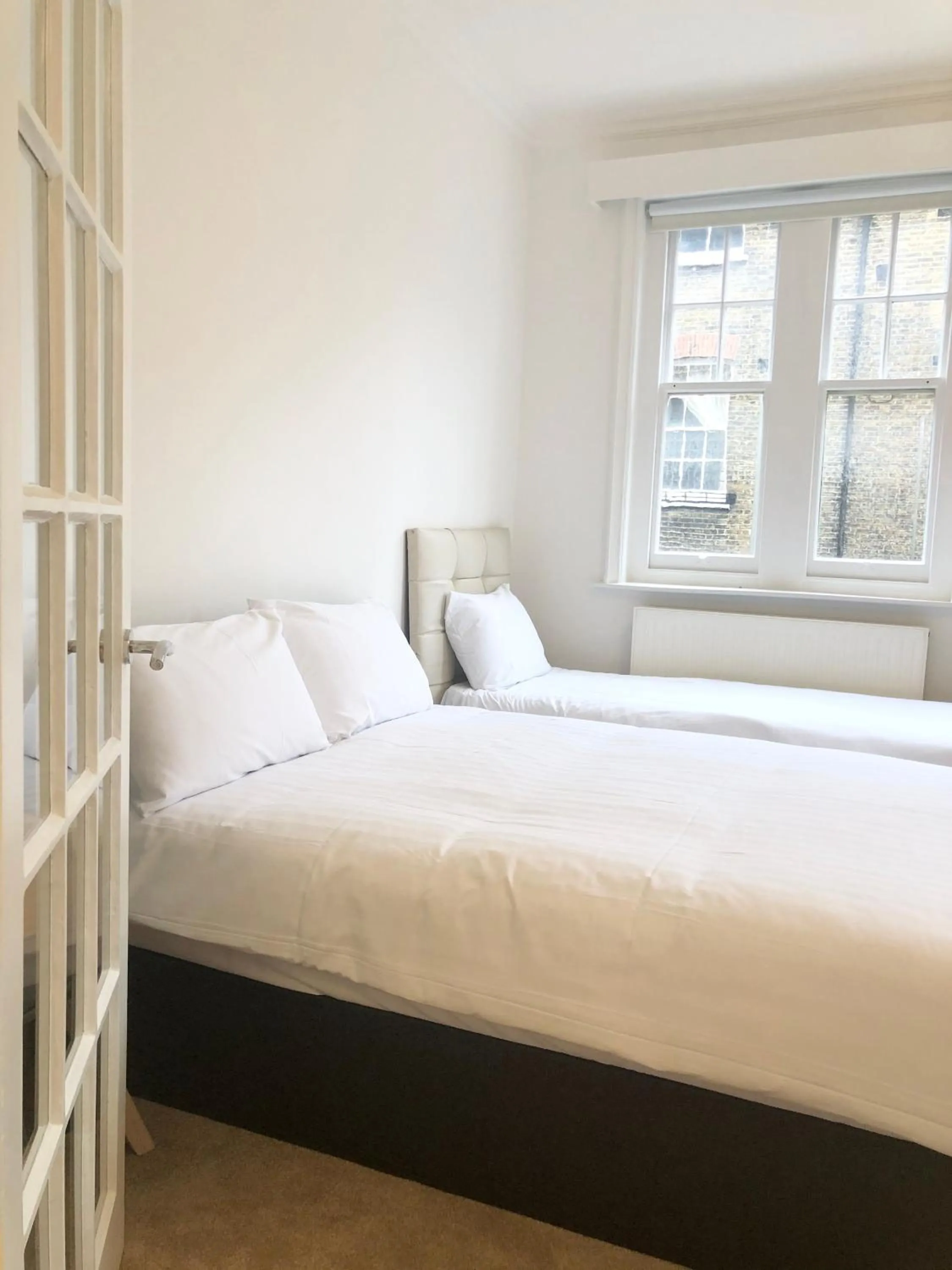 Bed in Stylish Maisonette and Studio in Victoria