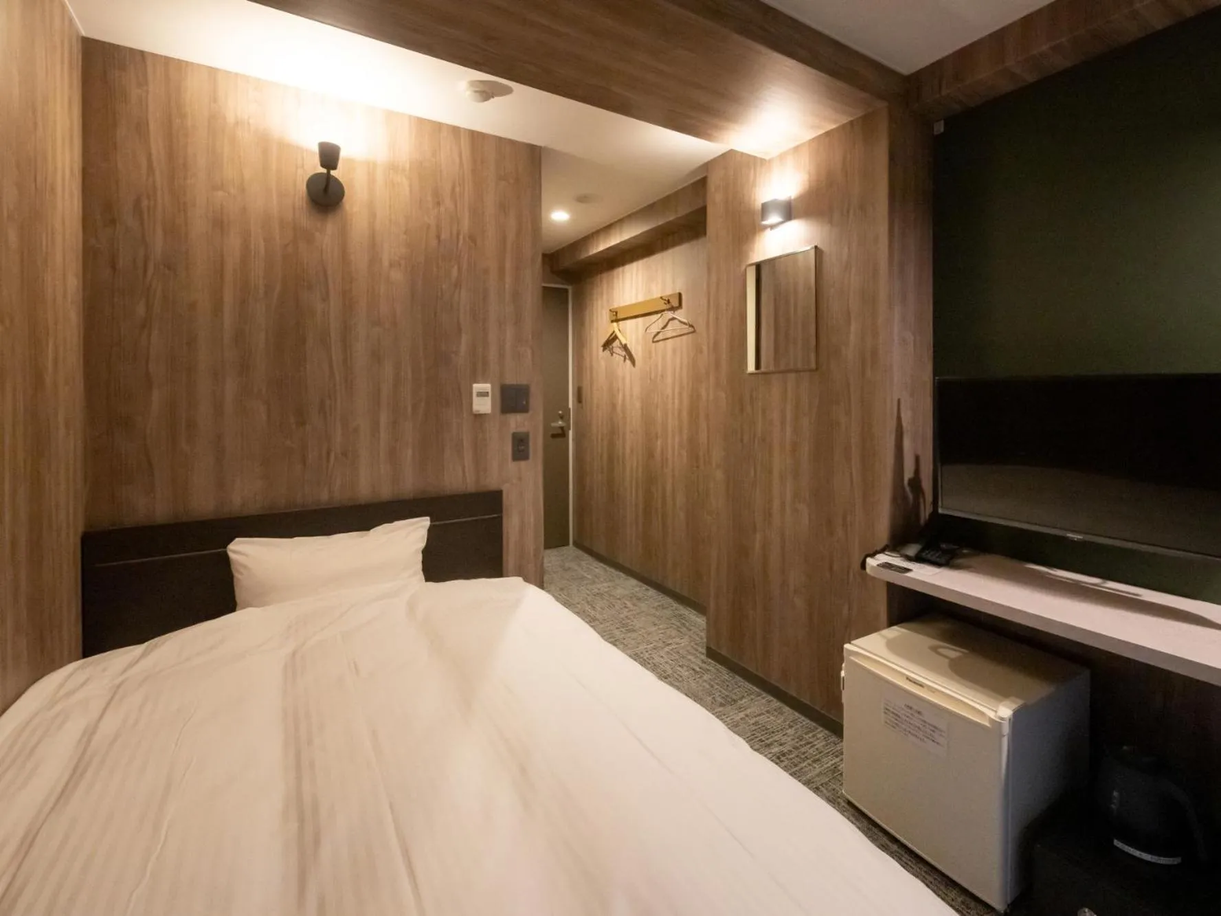 Bed in Hotel Oyanagi