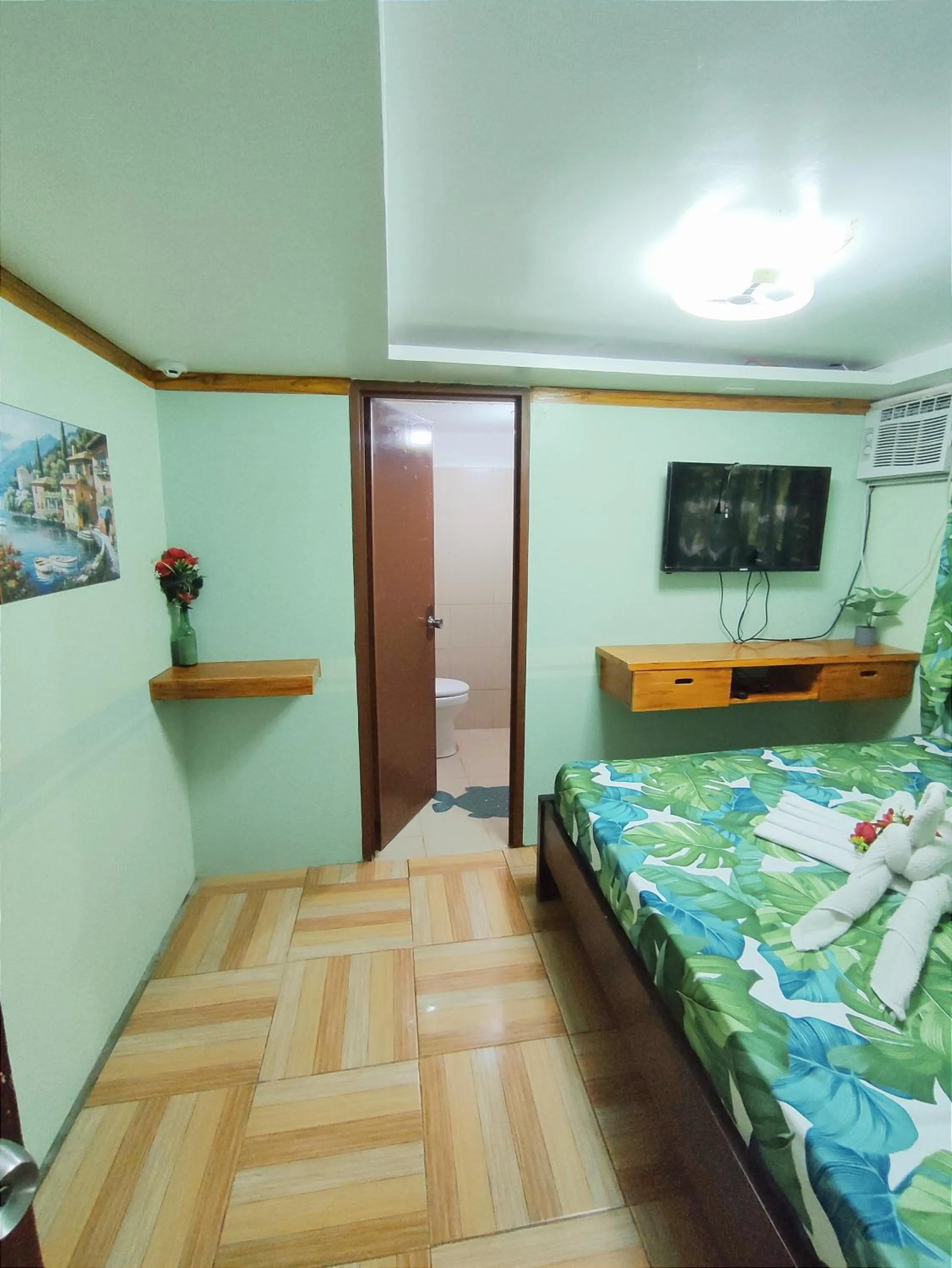 Bed in Blue Lagoon Inn and Restaurant, Pagudpud