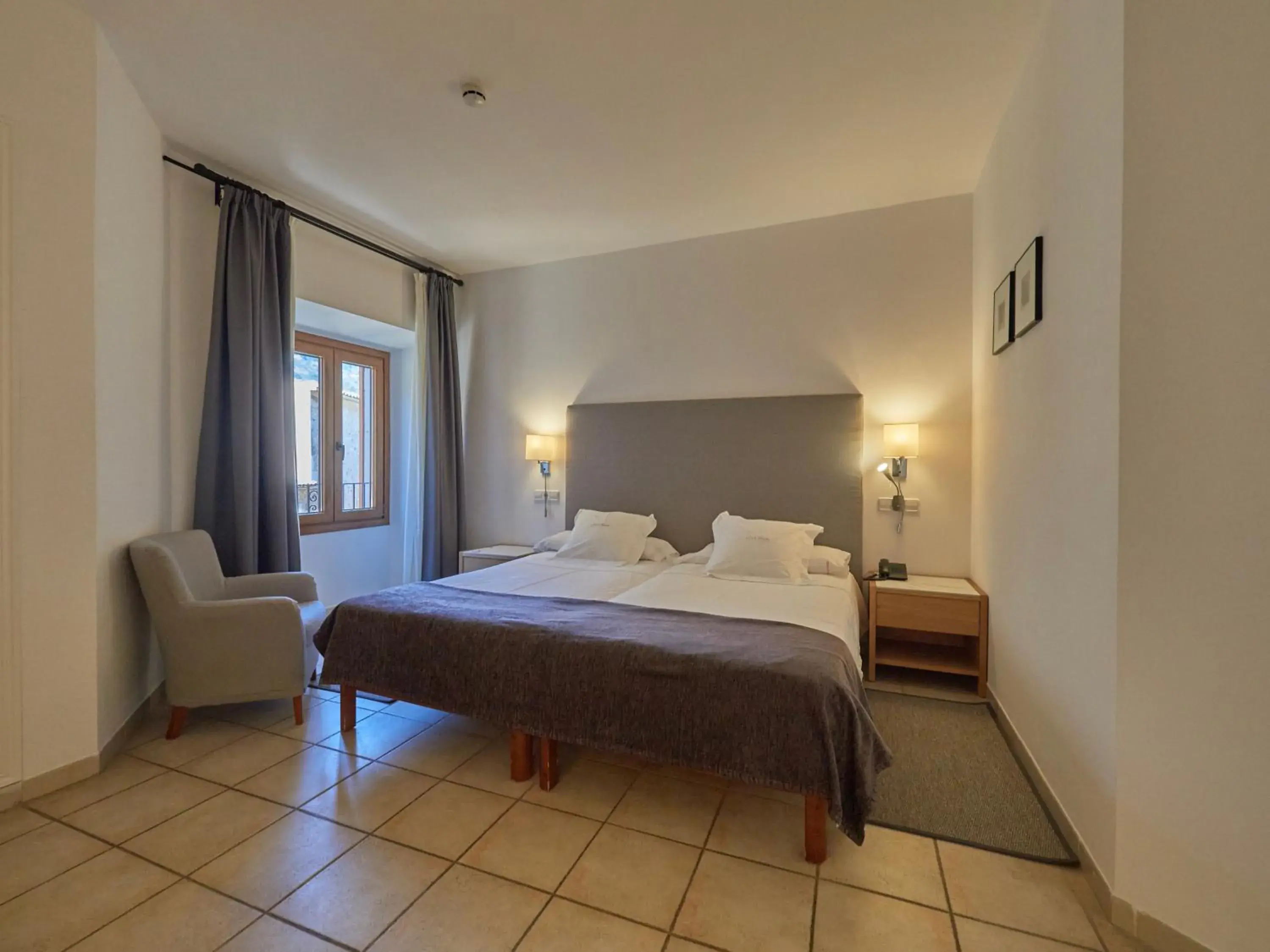 Bed in Hotel Ca'l Bisbe Bed in Hotel Ca'l Bisbe