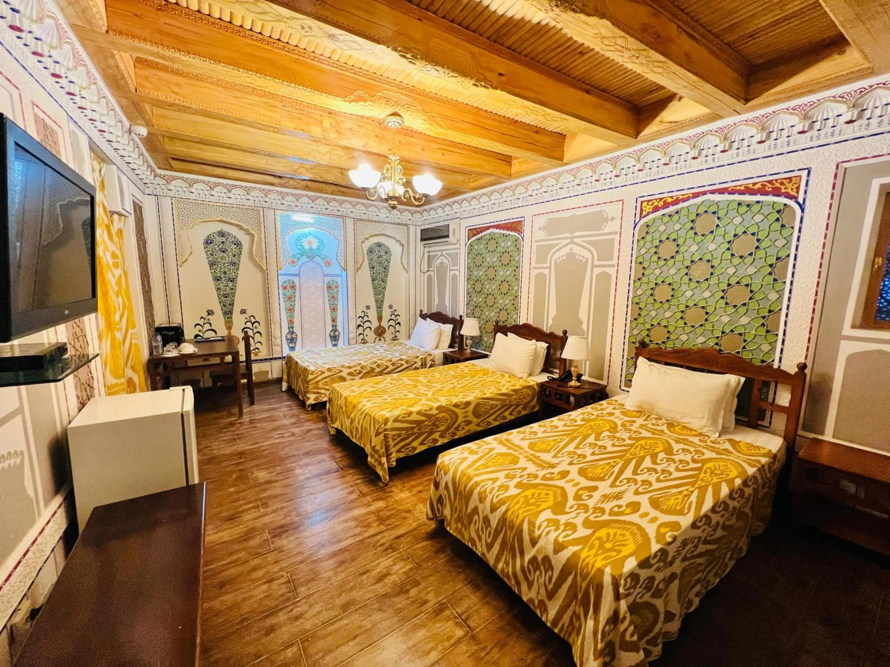 Bed in Komil Bukhara Boutique Hotel
