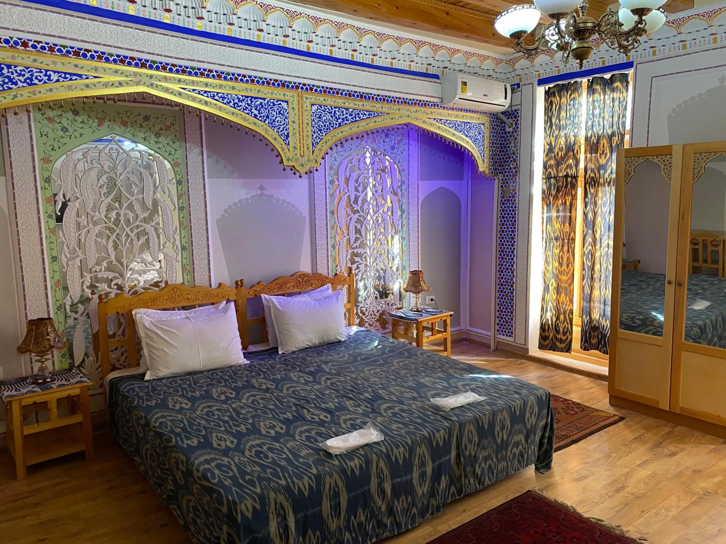 Bed in Komil Bukhara Boutique Hotel