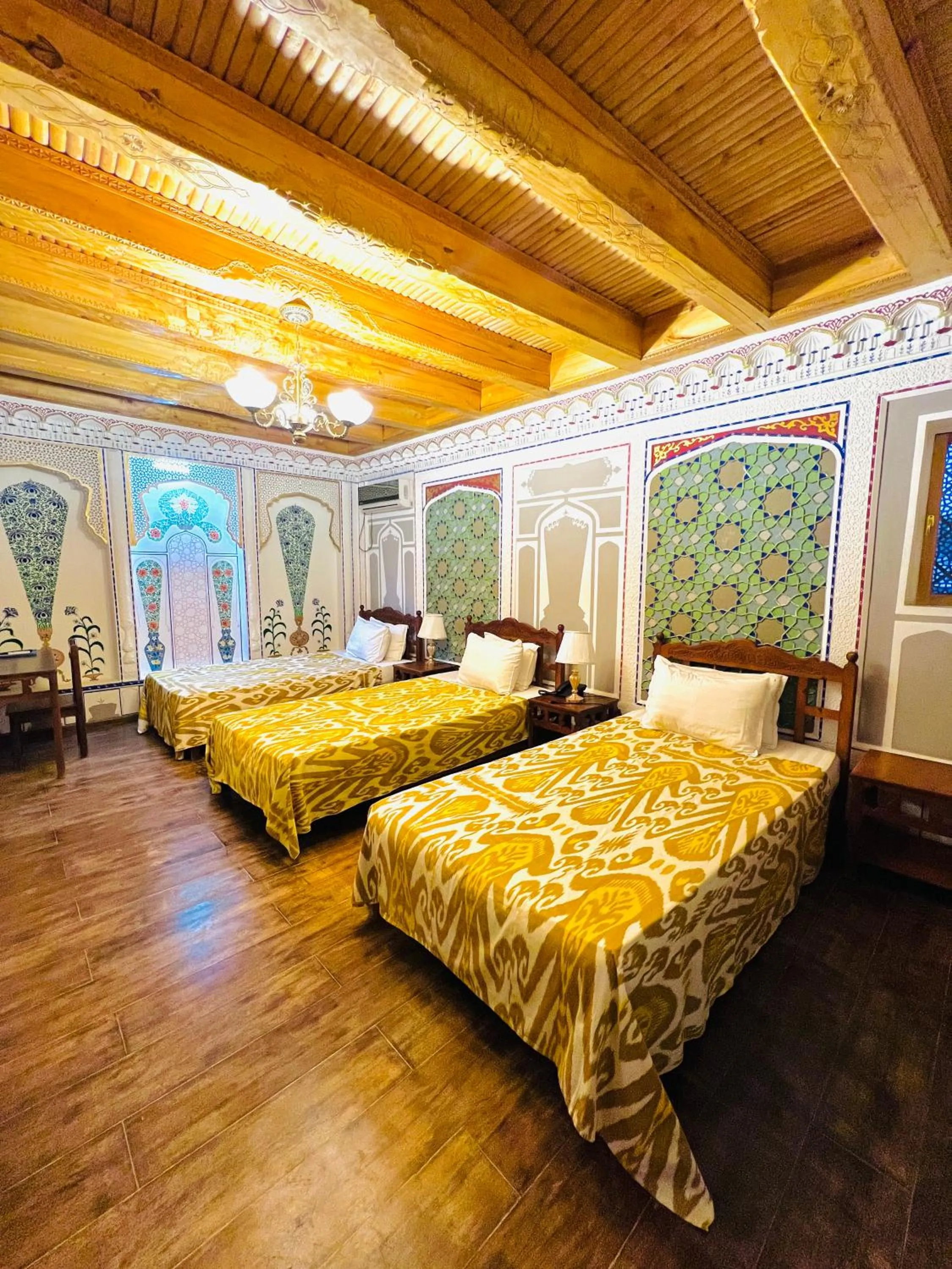Bed in Komil Bukhara Boutique Hotel