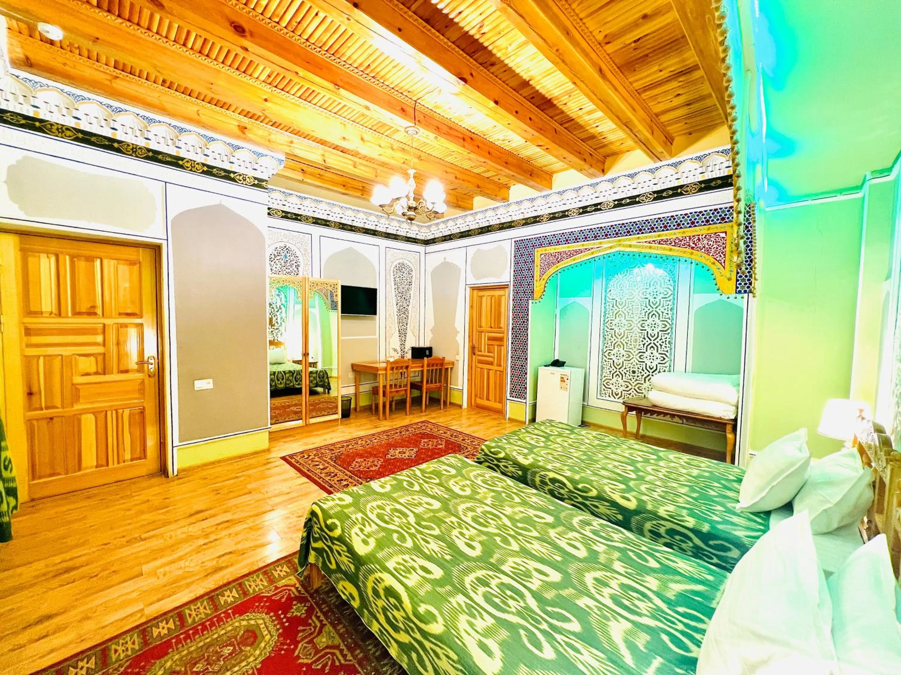 Bed in Komil Bukhara Boutique Hotel