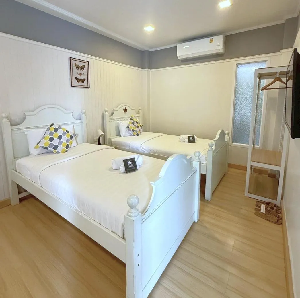 Bed in La Riva Boutique Hotel